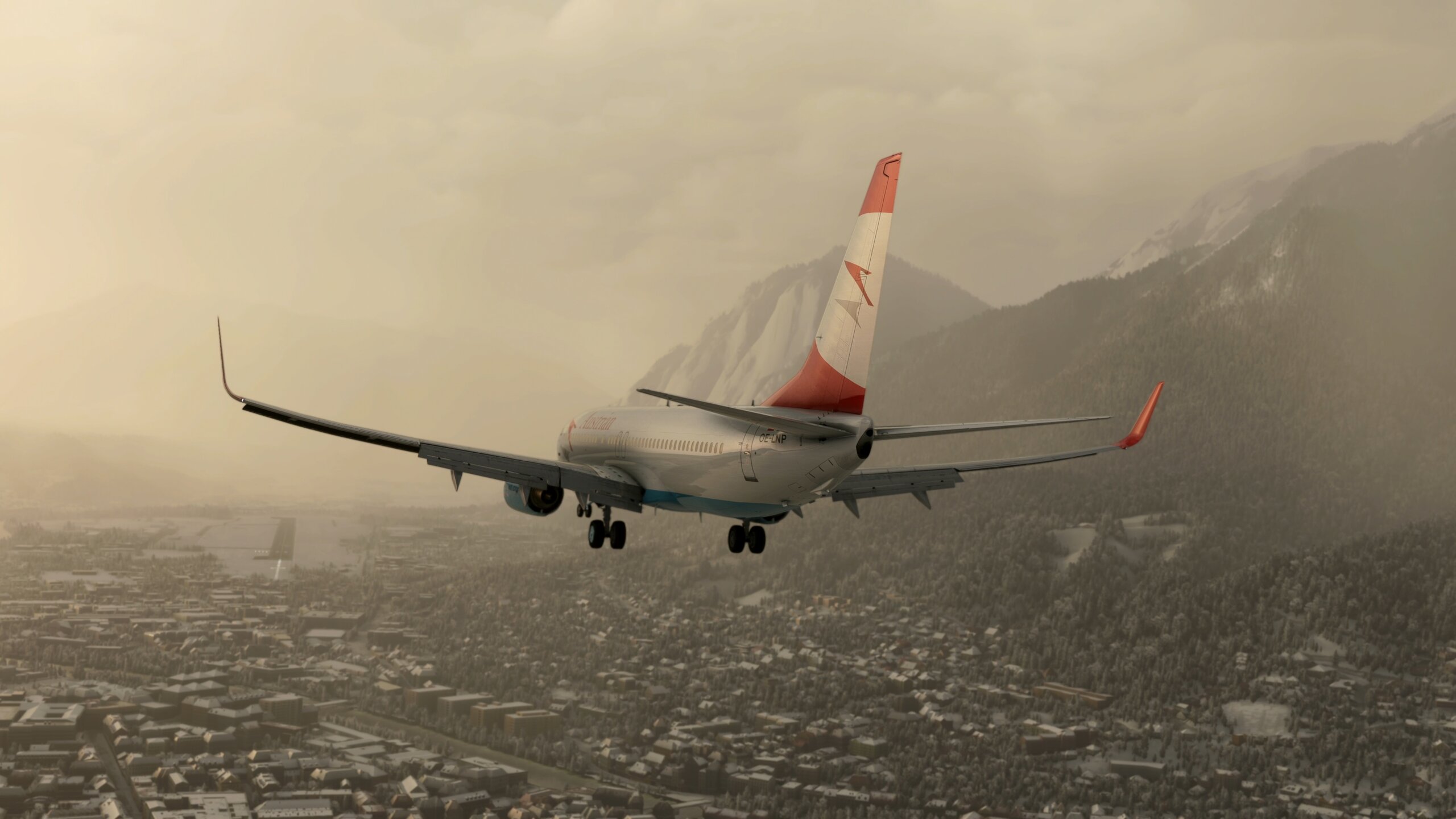 An Austrian Airlines Boeing 737 on final approach to runway 26 at Innsbruck airport, Austria