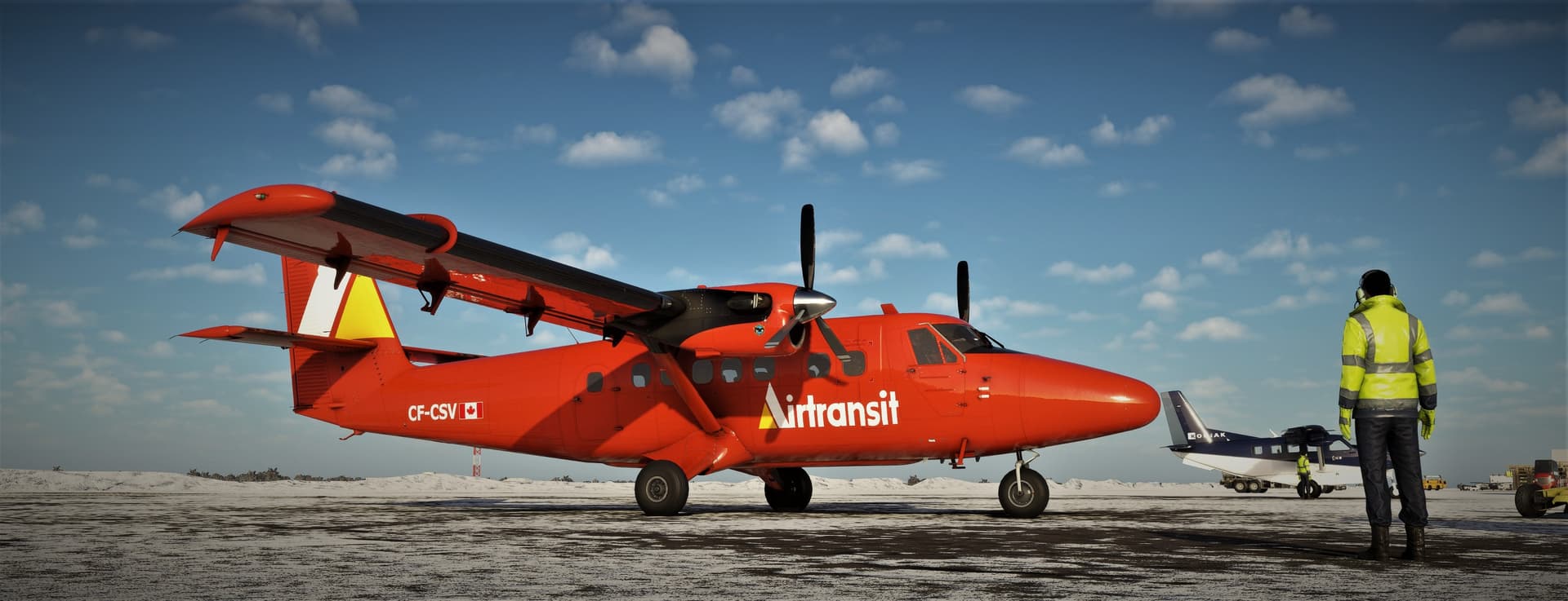 A red Airtransit Twin Otter sits on a cold icy apron