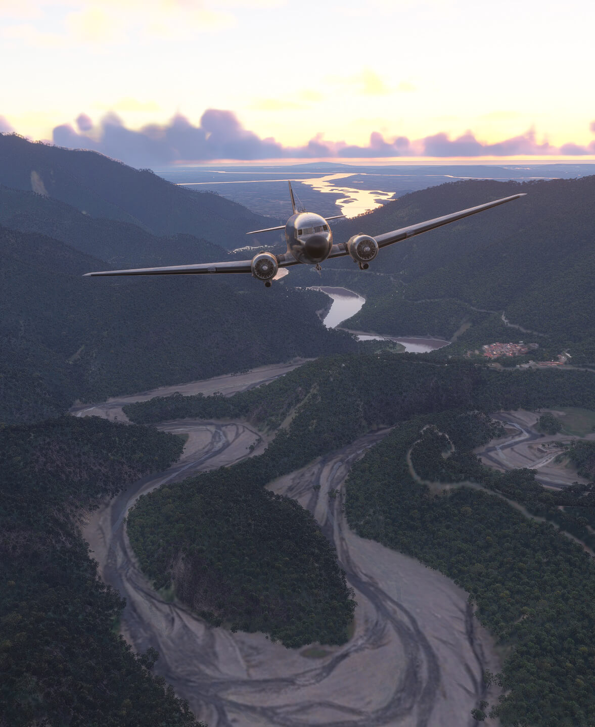 A DC-3 flies over a winding river