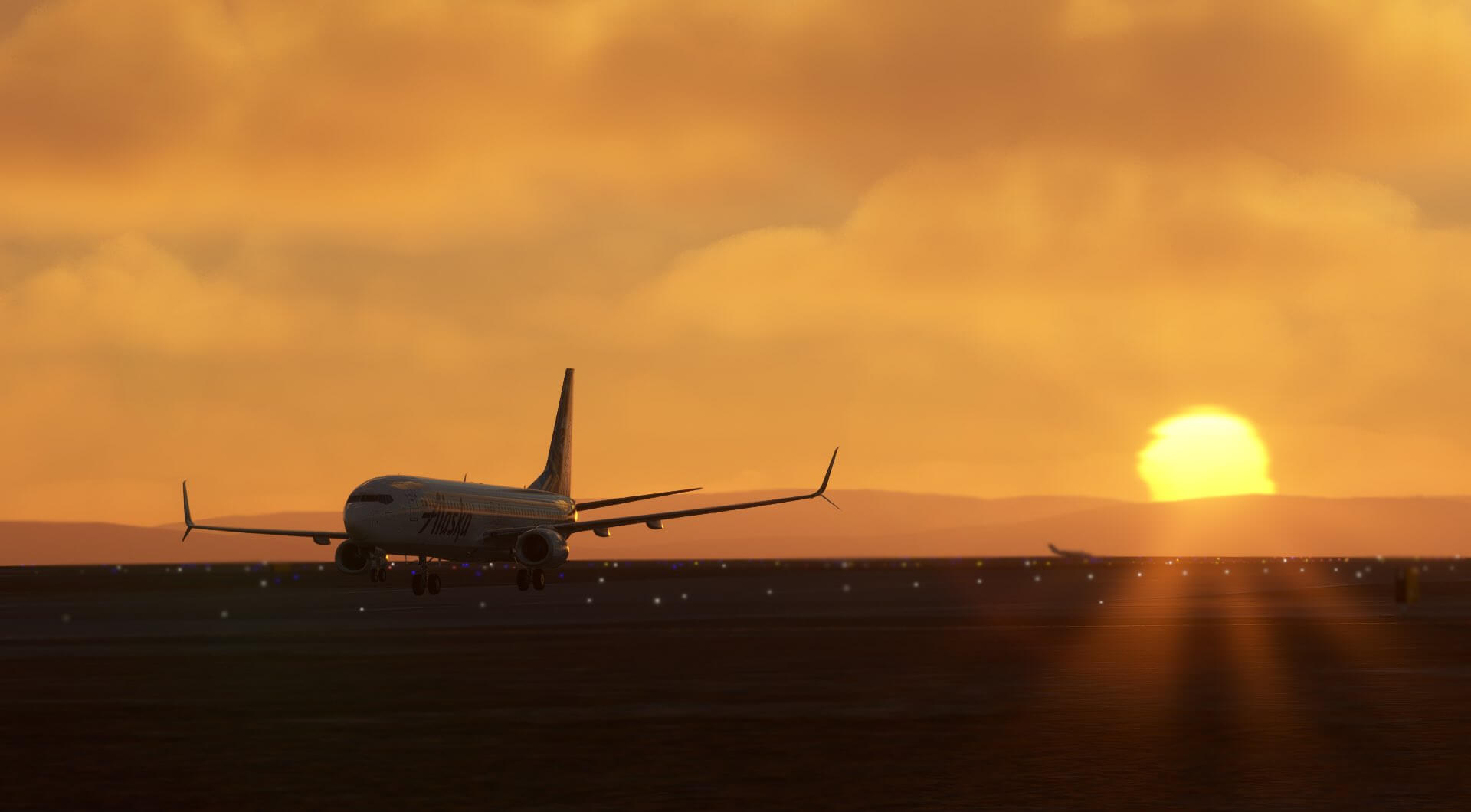 An Alaska Airlines Boeing 737 on a runway with the sun setting in the distance behind