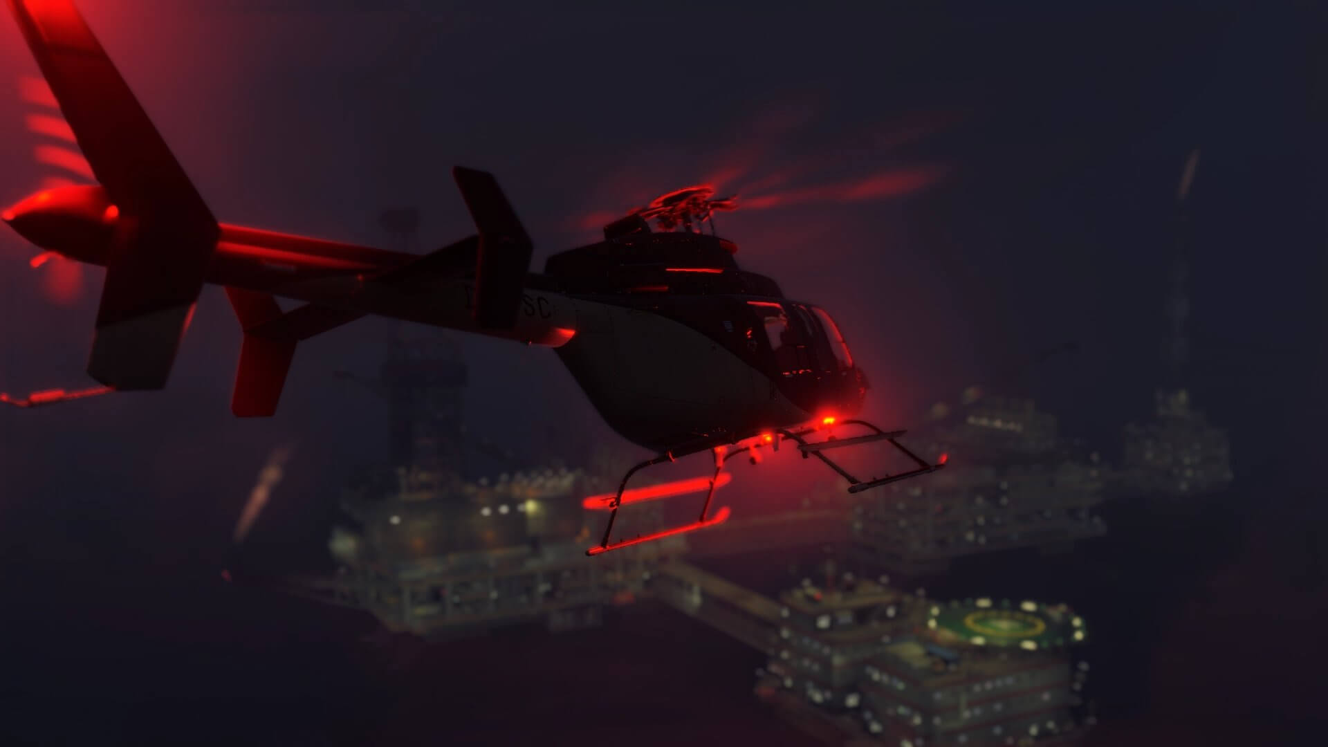 A Bell 407 with red beacon light flashing banks left towards an oil rig landing zone