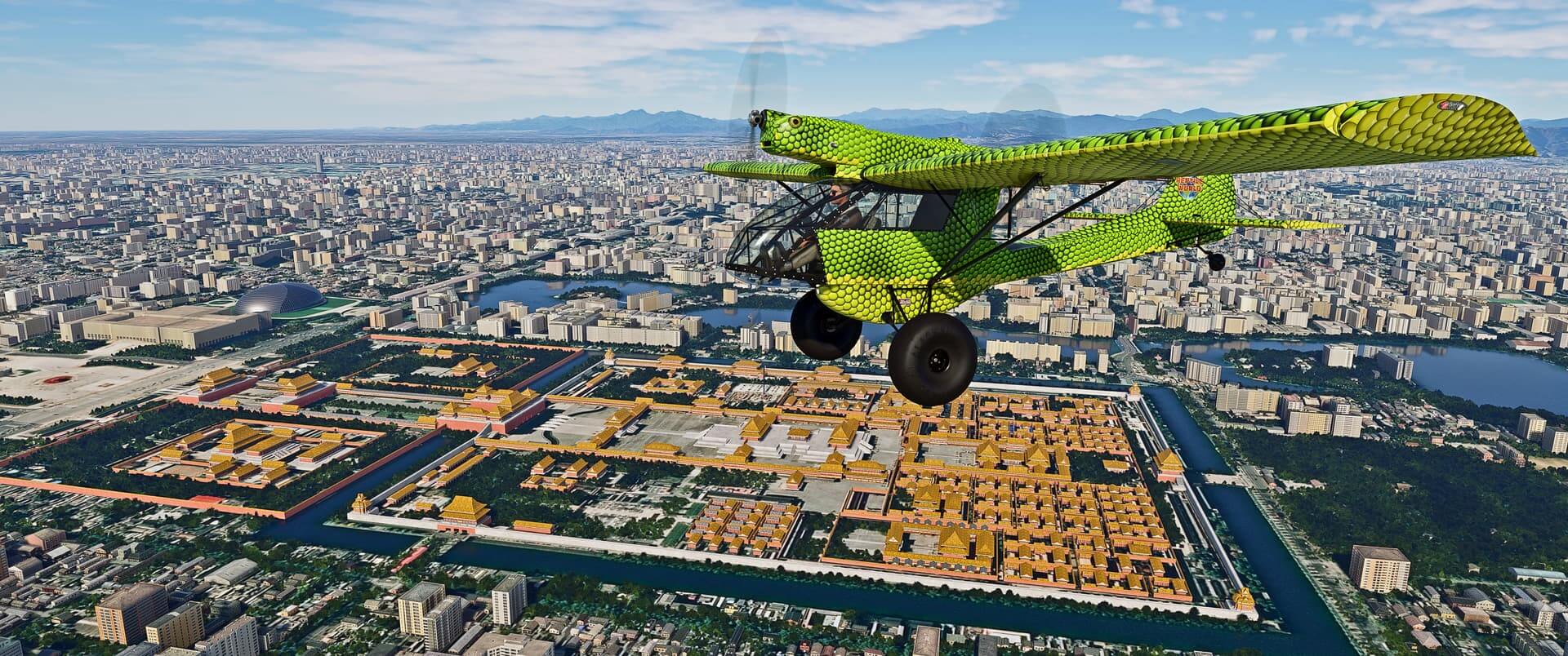 A green snake painted propeller aircraft flies over a busy cityscape