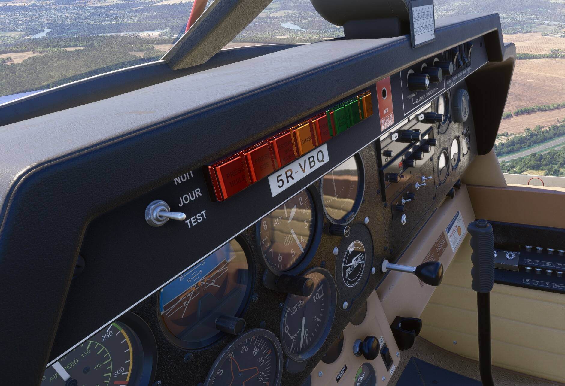 An interior cockpit view of an aircraft's instrument panel.