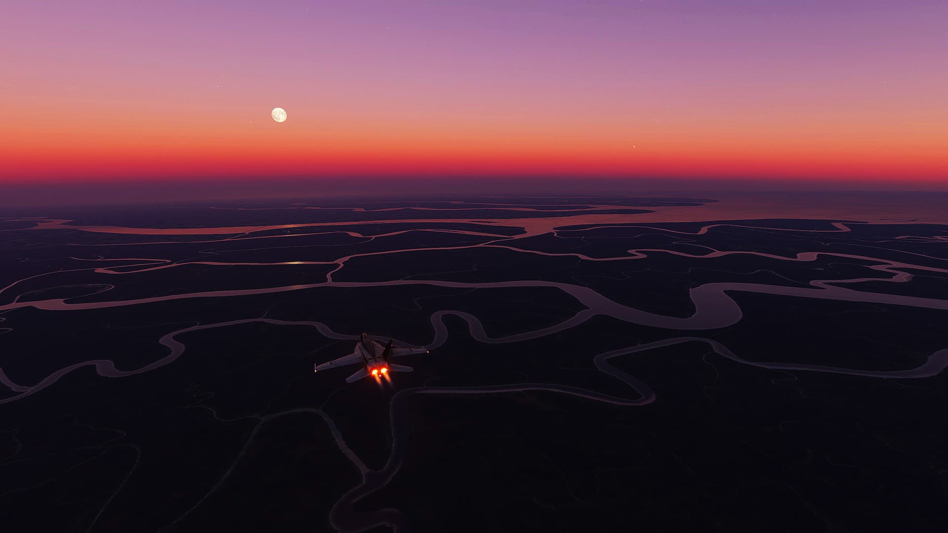 An F-18 has afterburners lit whilst flying over rivers during golden hour