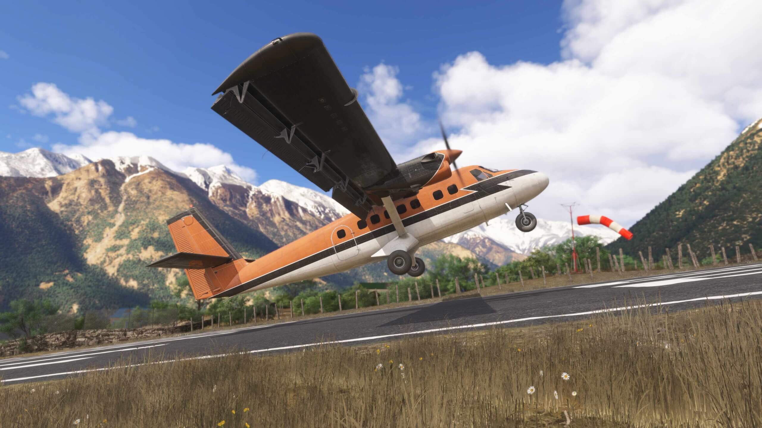 A Twin Otter flares for landing at Lukla airport