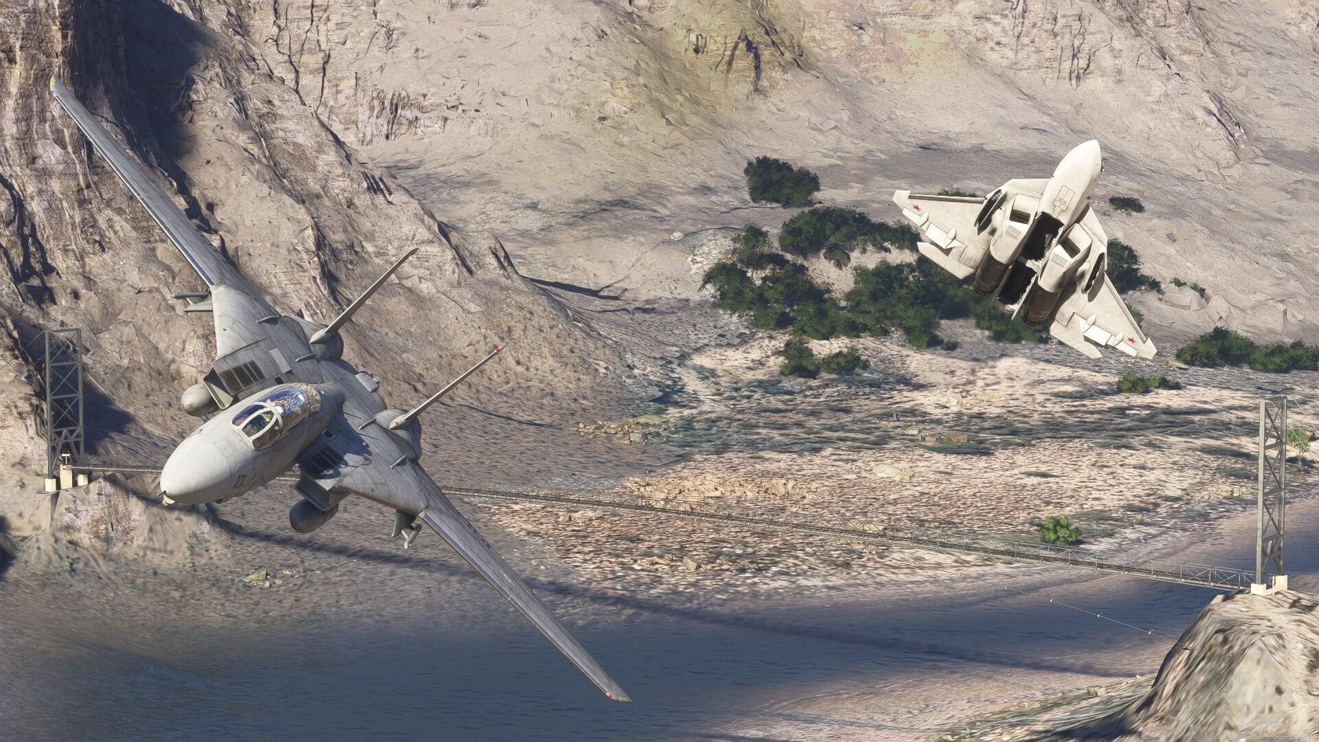 Two fighter jets fly in formation through a desert valley