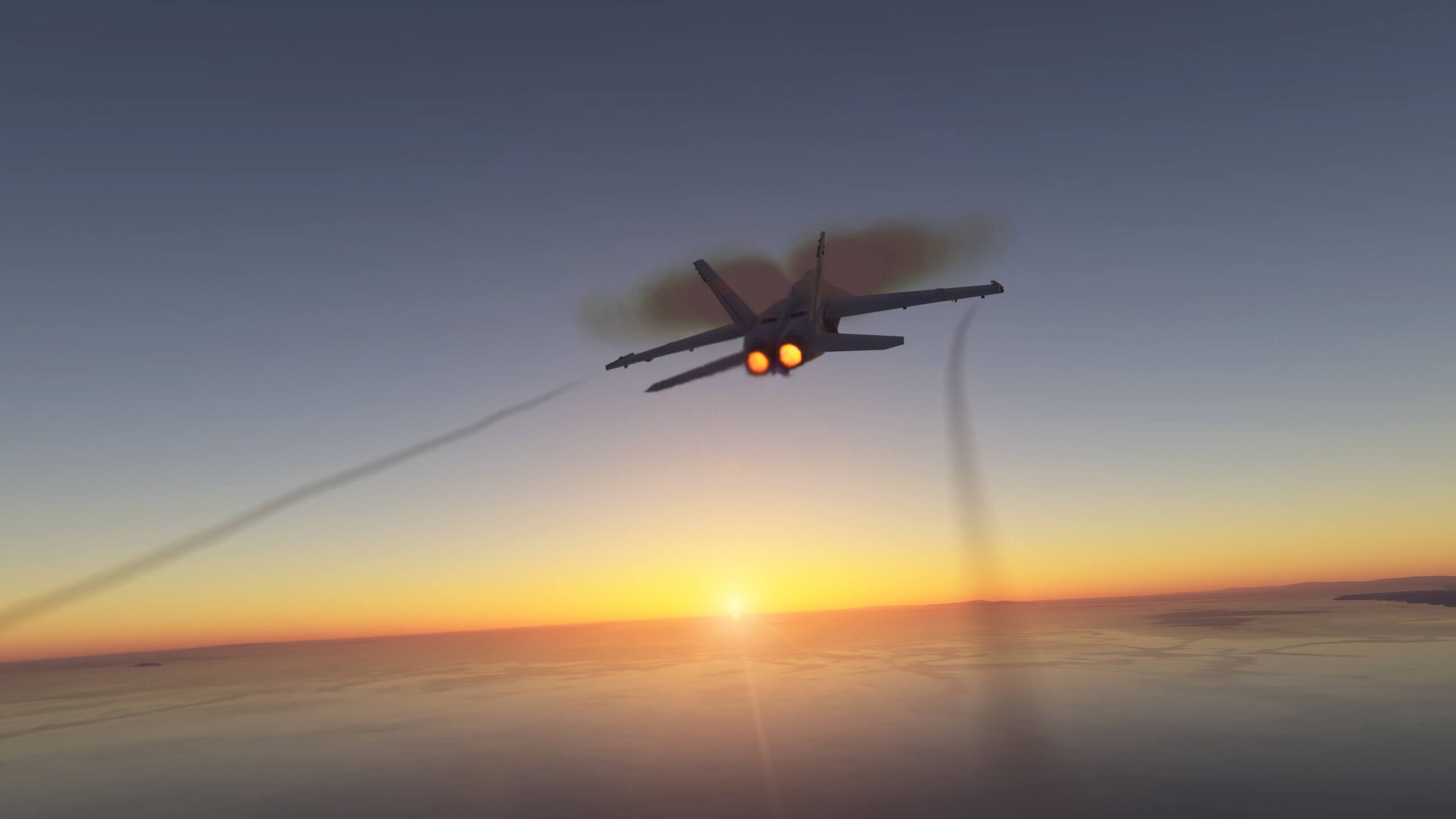 An F/A-18 Hornet climbs with afterburners engaged and the sun setting in the distance