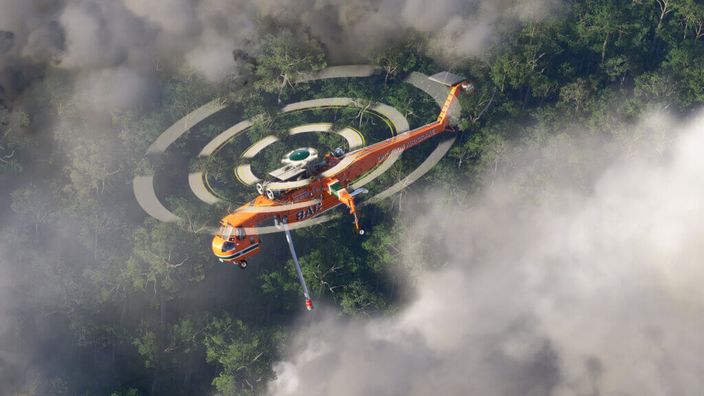 A firefighting helicopter flies above a smokey forest.