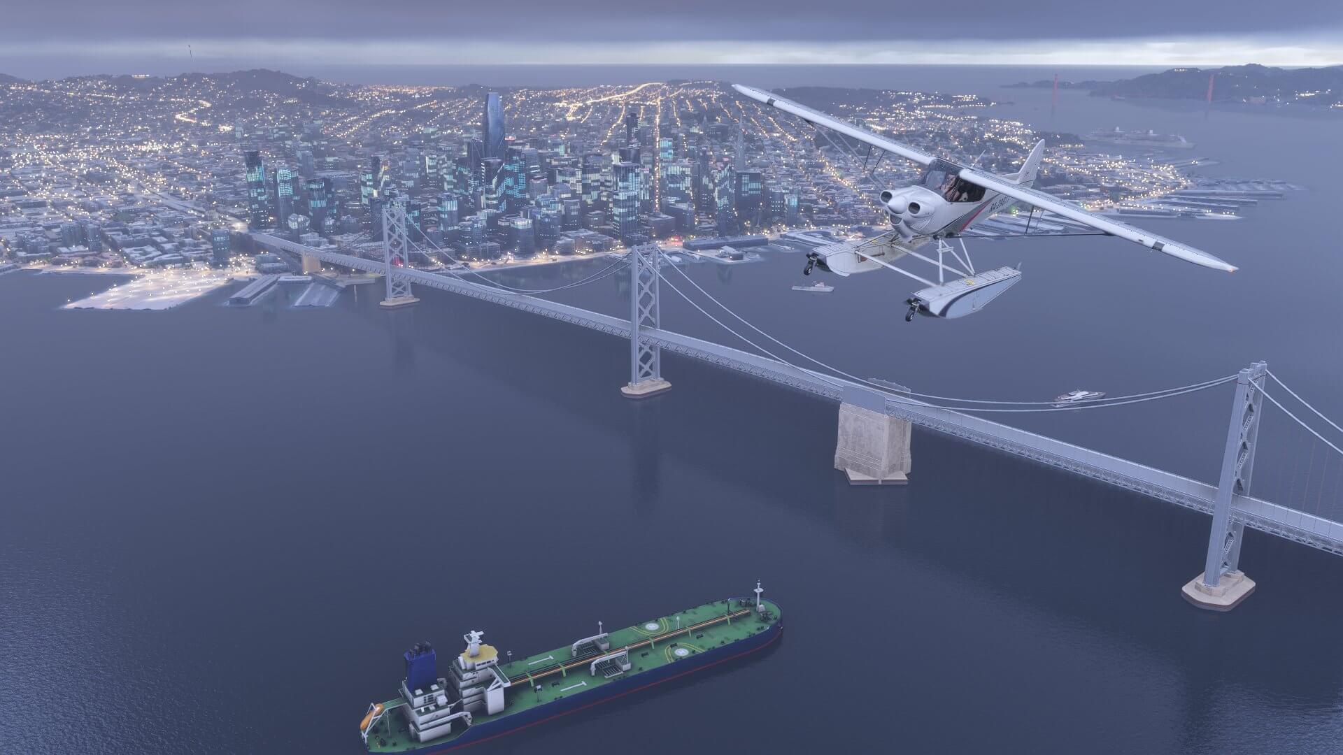 An X-Cub flies above a bridge and cargo ferry near a busy cityscape