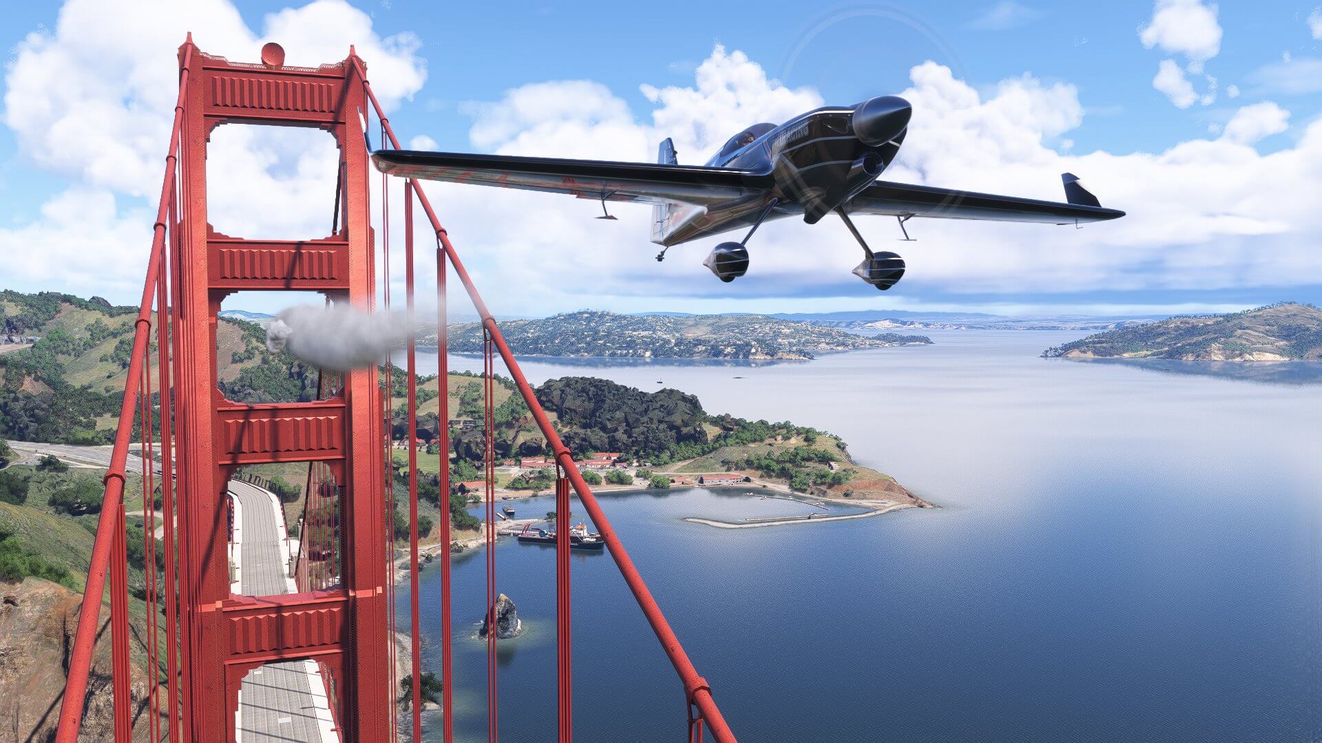 An Extra 330 flies through the Golden Gate Bridge, San Francisco