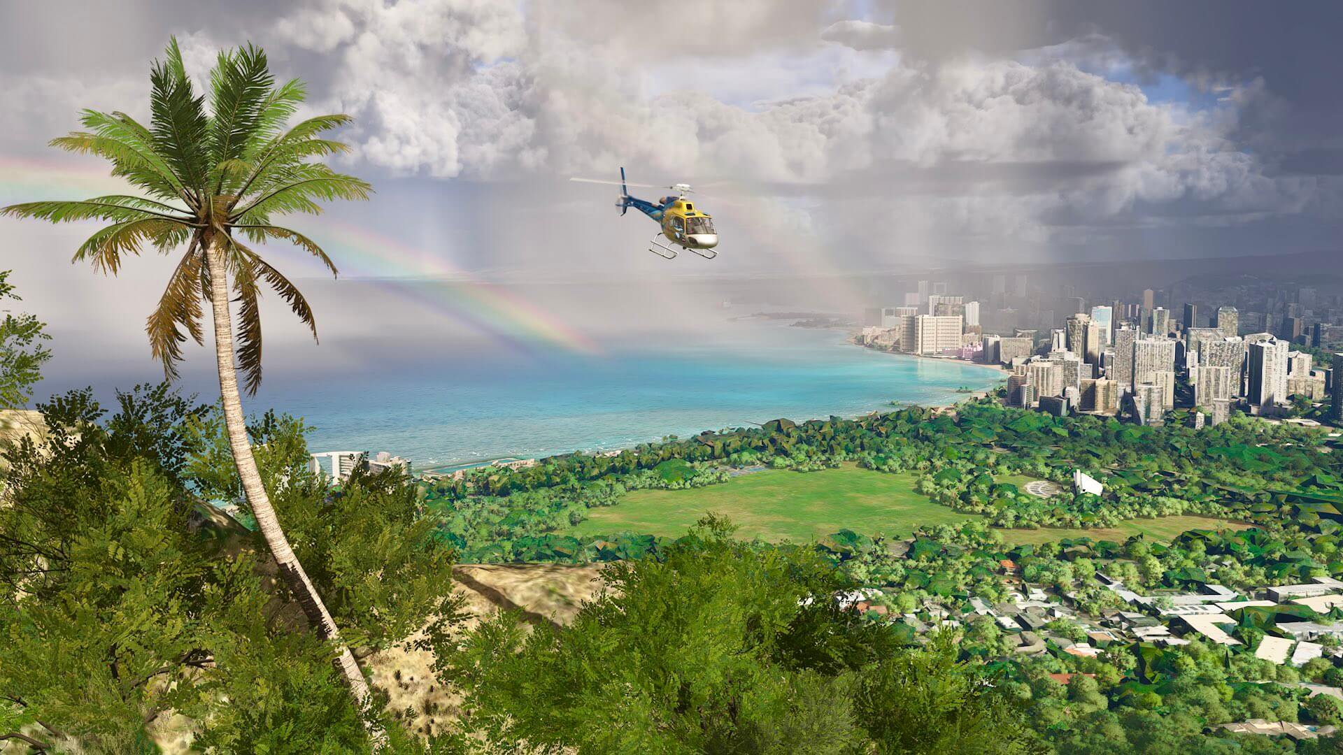 An H125 helicopter flies away from a rainbow whilst exploring Honolulu, Hawaii