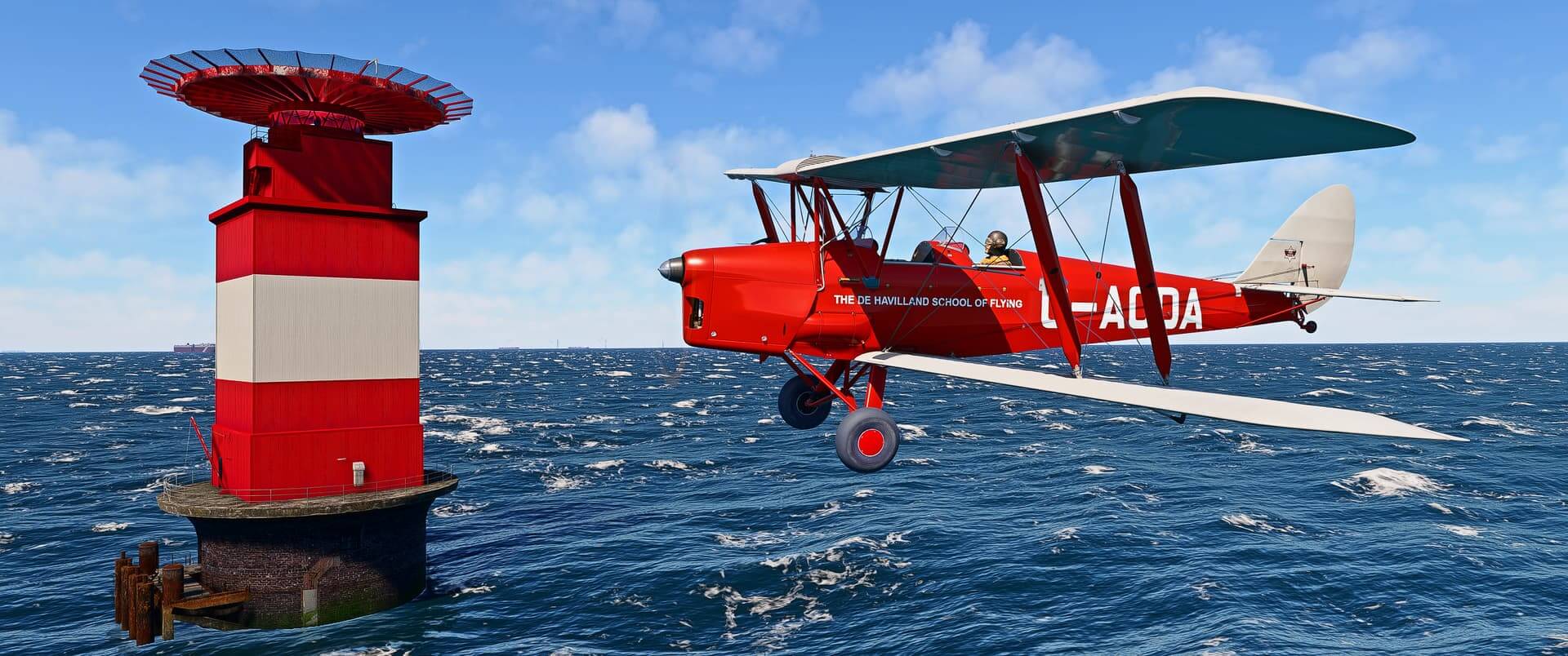 A De Havilland dual wing propeller aircraft flies past a red and white landing pad in the sea