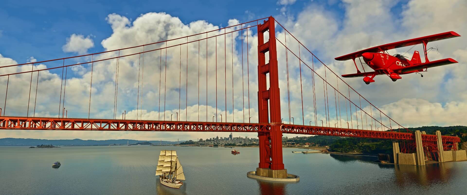 A red dual wing propeller aircraft flies parallel to the Golden Gate Bridge, San Francisco