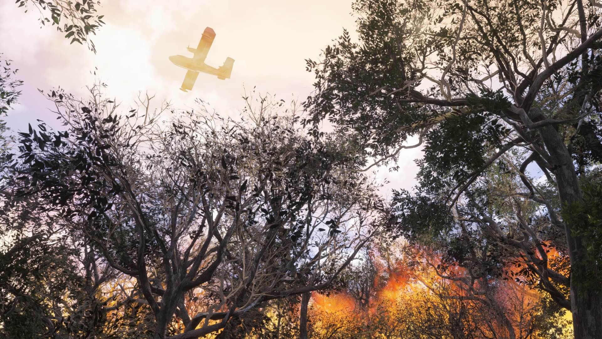 A CL-415 firefighting aircraft flies over a forest fire