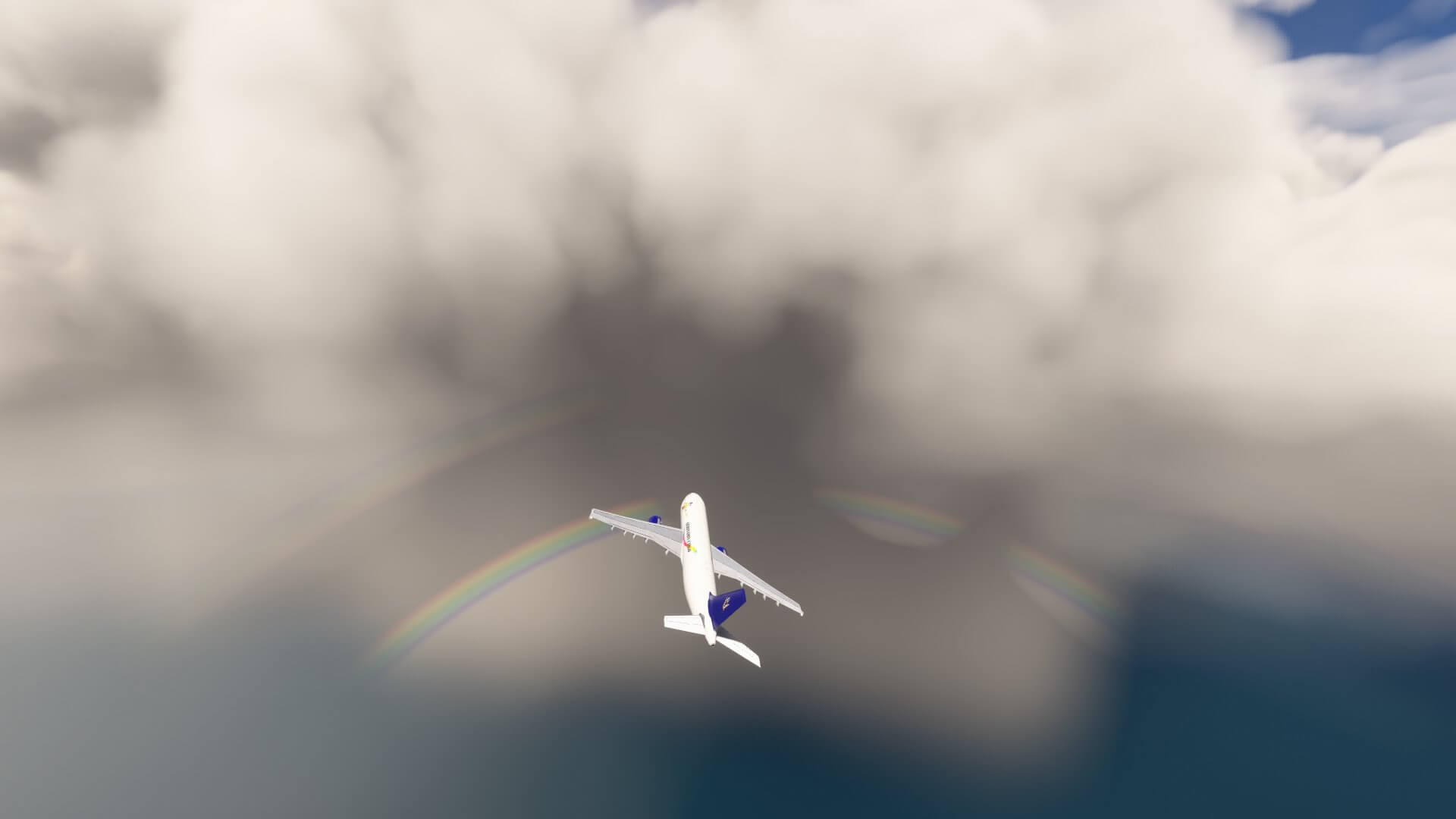 An airliner flies towards a double rainbow through clouds
