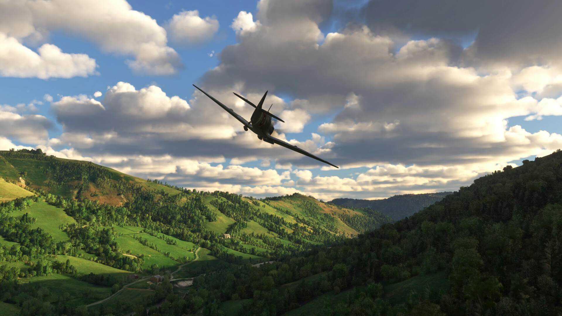 A Spitfire banks right whilst flying through a valley