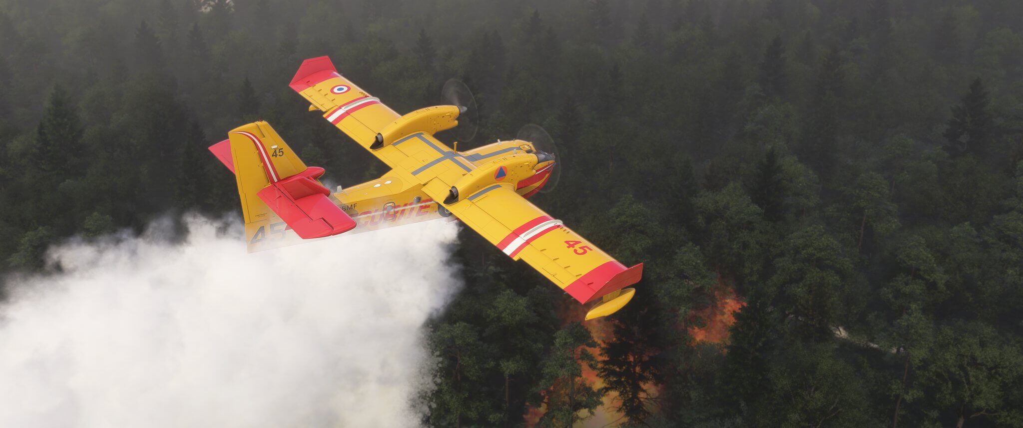 A Canadair CL-415 releases water on a forest fire.