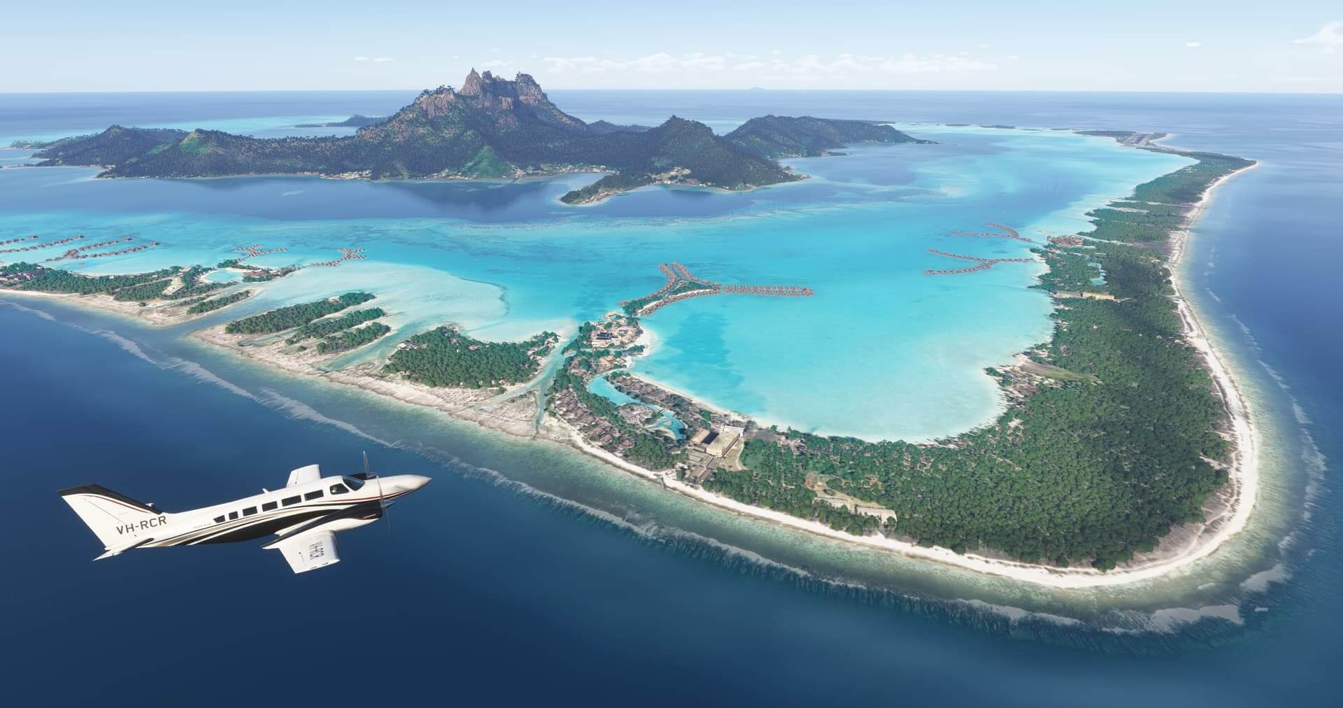 A low wing propeller aircraft cruises near an island