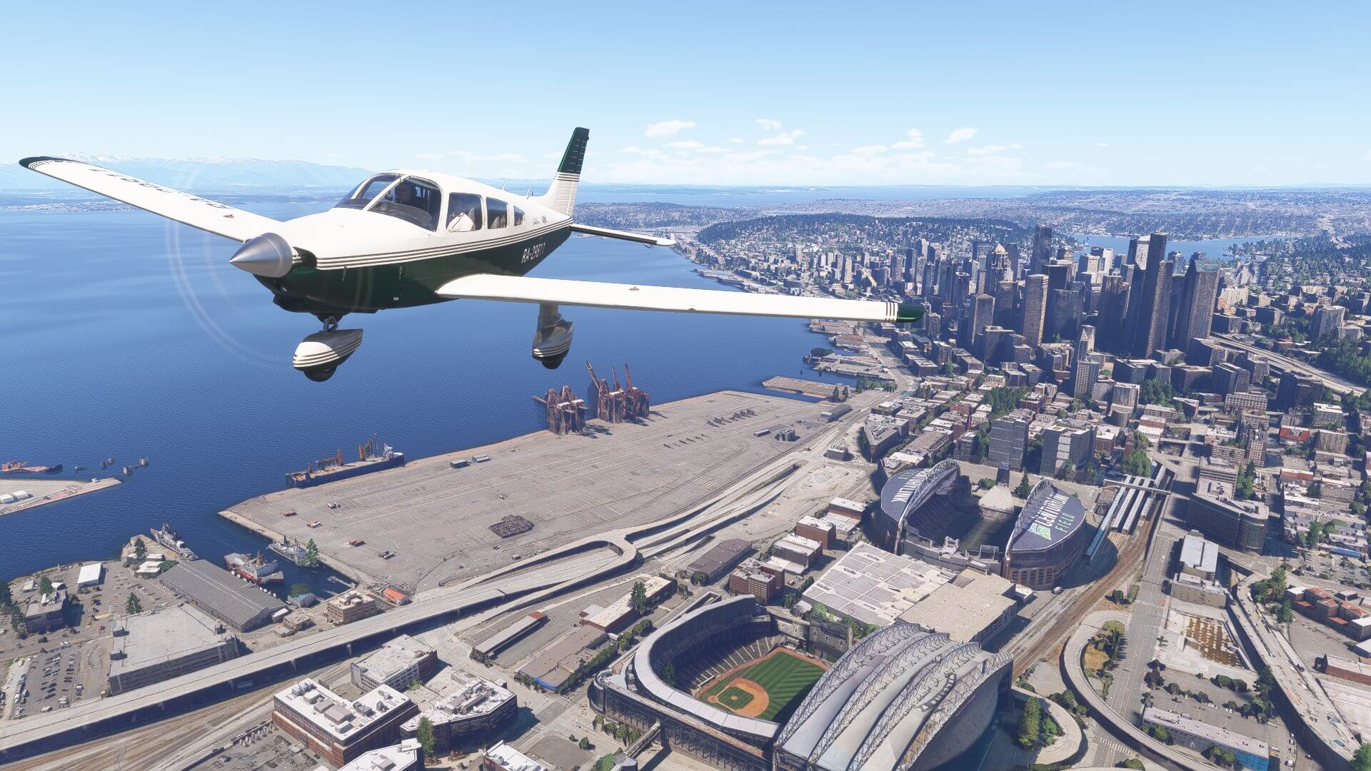 A Piper PA-28-236 Dakota flying over Seattle city