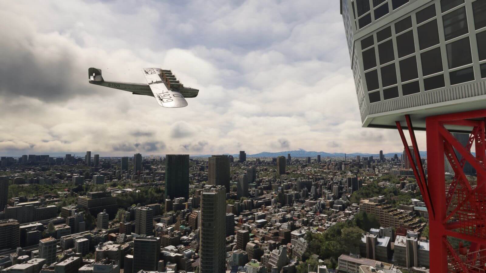 A Spruce Goose banks right whilst flying low over a city