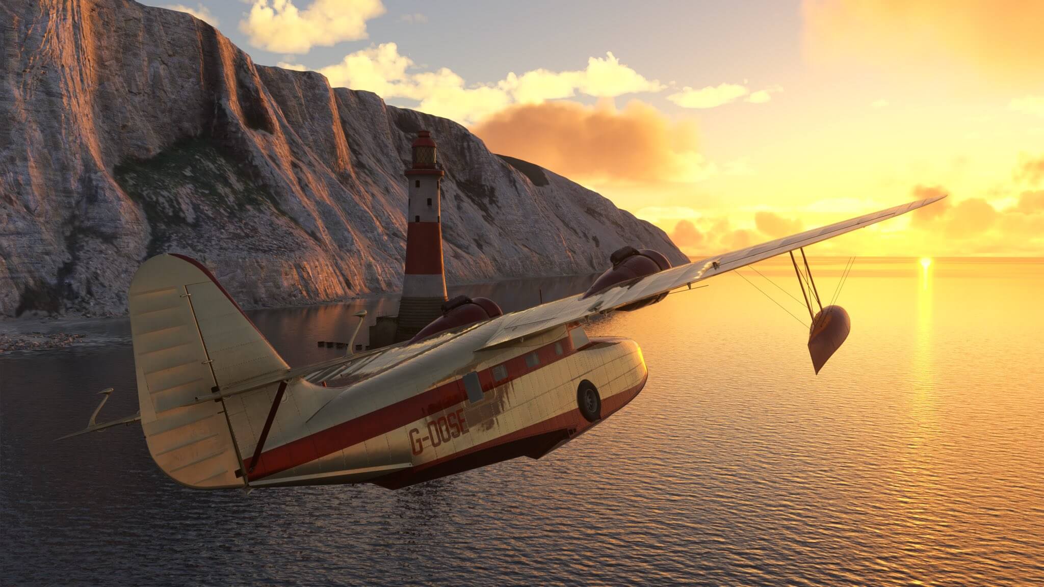 The Spruce Goose banks left whilst flying near a lighthouse, with the sun on the horizon in the distance