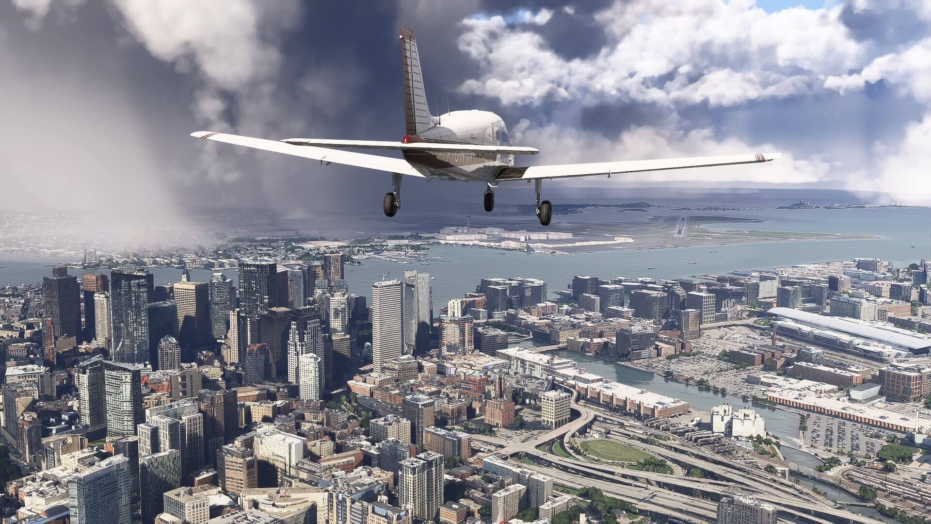 A low wing propeller aircraft on final approach for runway 09 at Boston Logan airport