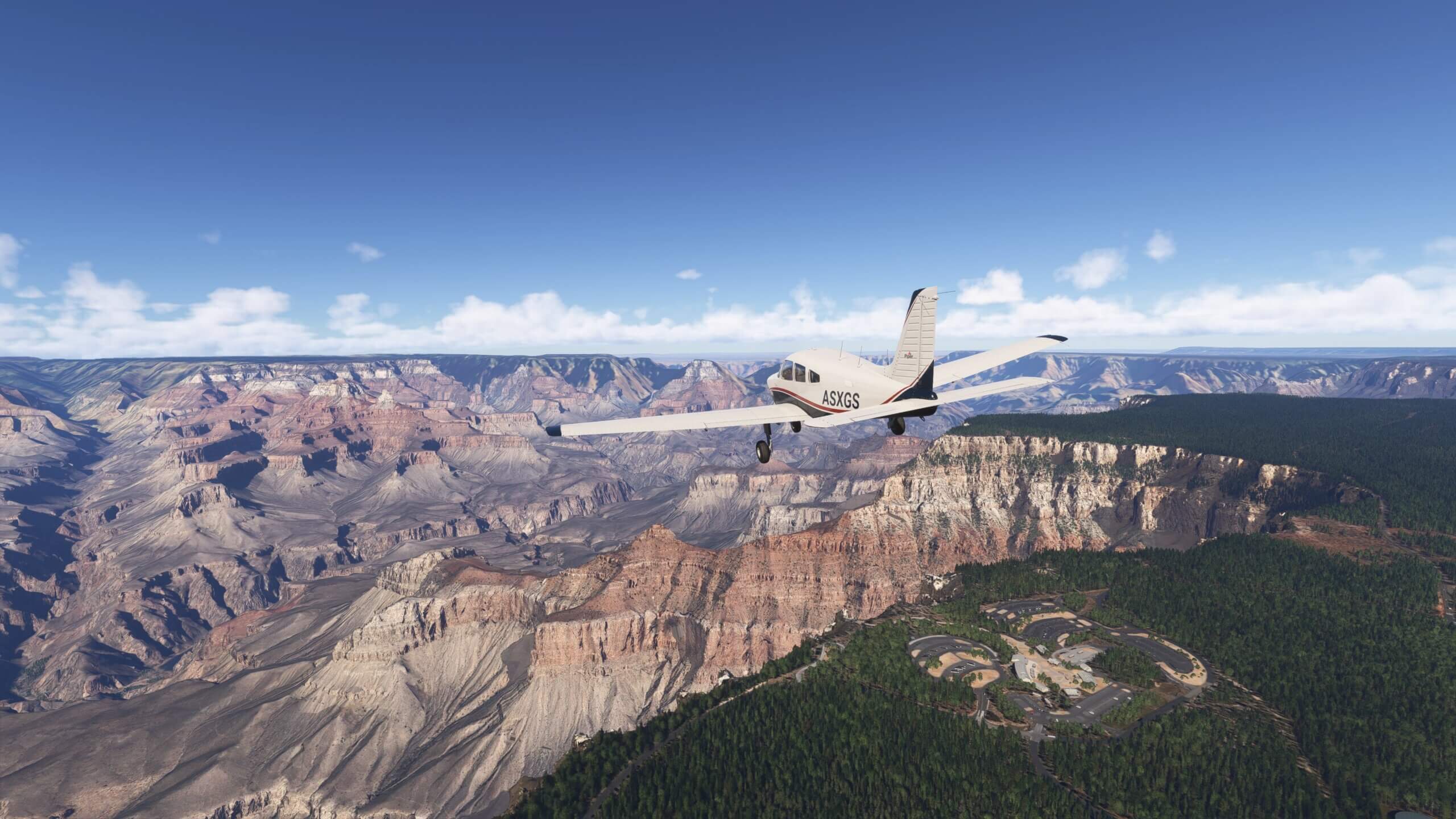 A Piper PA-28-236 Dakota flying over the Grand Canyon
