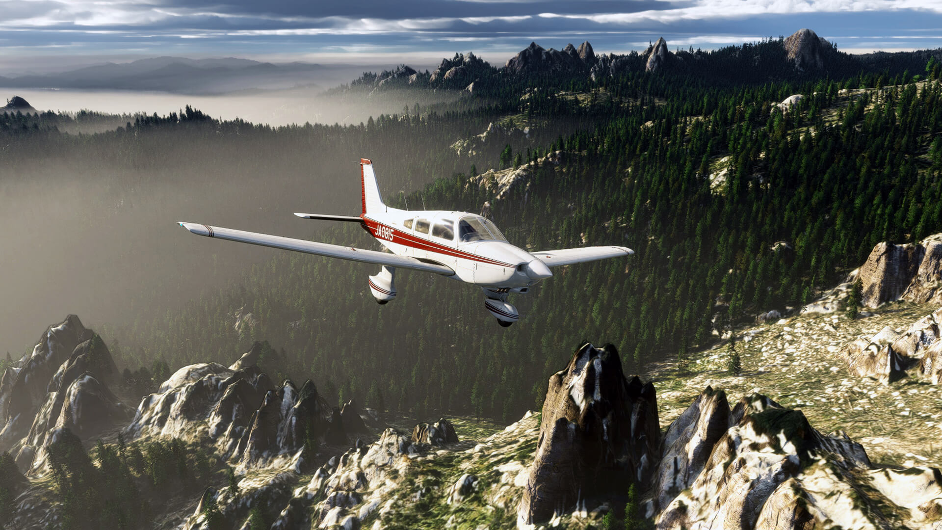 A Piper PA-28-236 Dakota avoids rocky terrain below