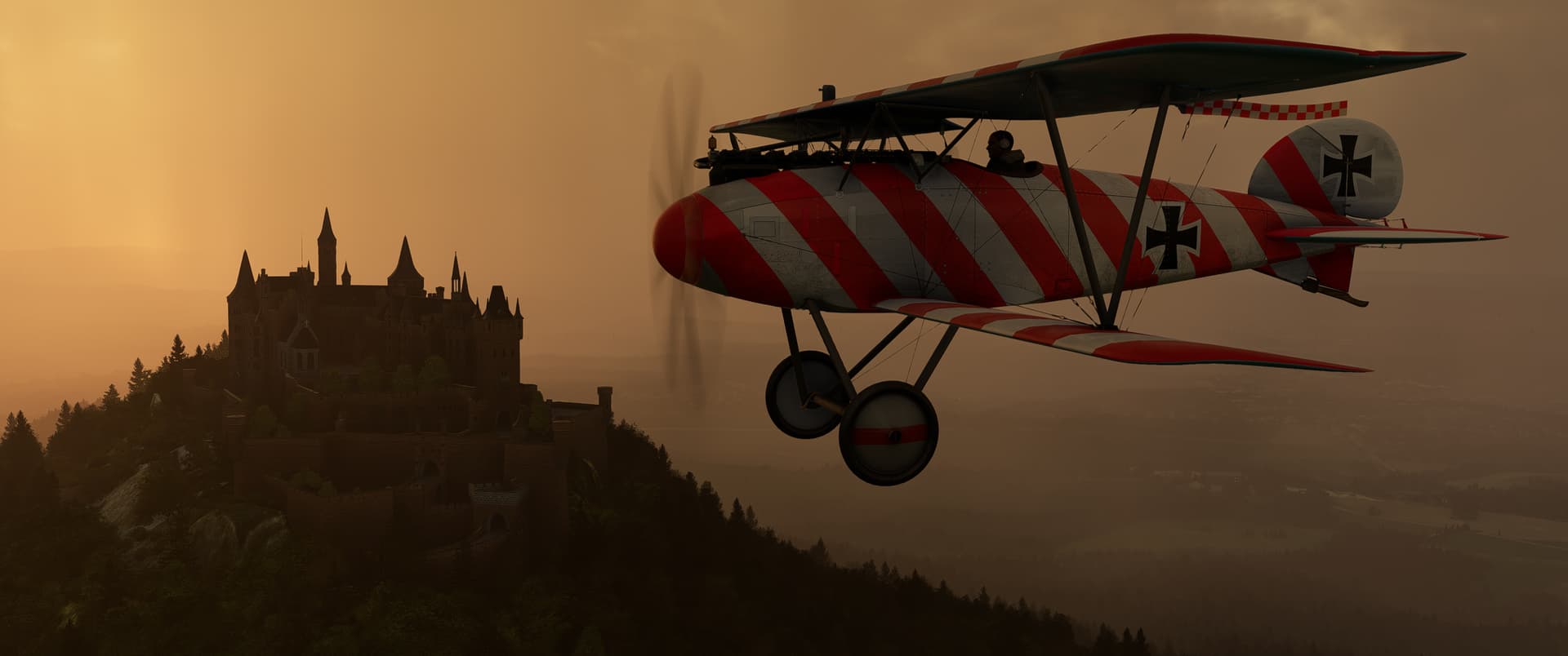 A dual wing red and white aircraft flies past a castle in low visibility conditions
