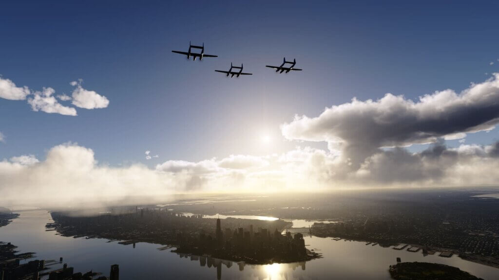Three propeller aircraft fly in close formation over New York city