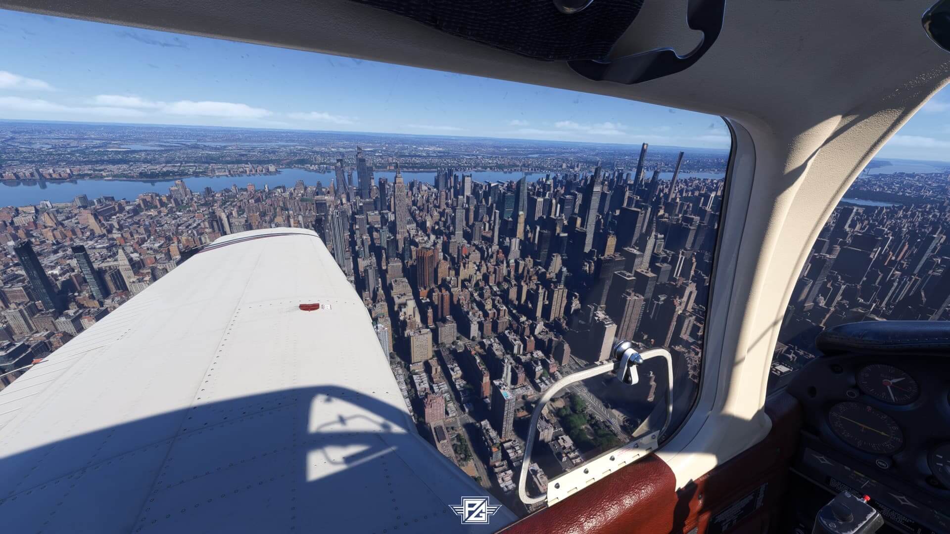 Looking out over the wing of a Piper PA-28-236 Dakota flying over New York city