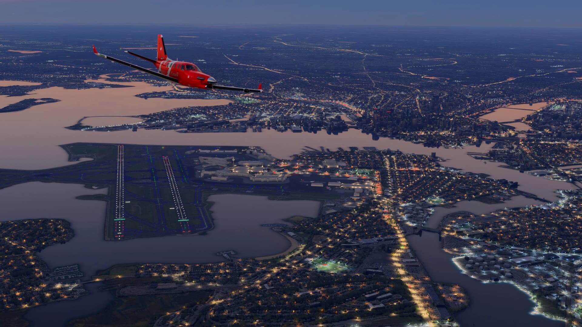 A red painted TBM aircraft cruises over the top of Boston Logan airport