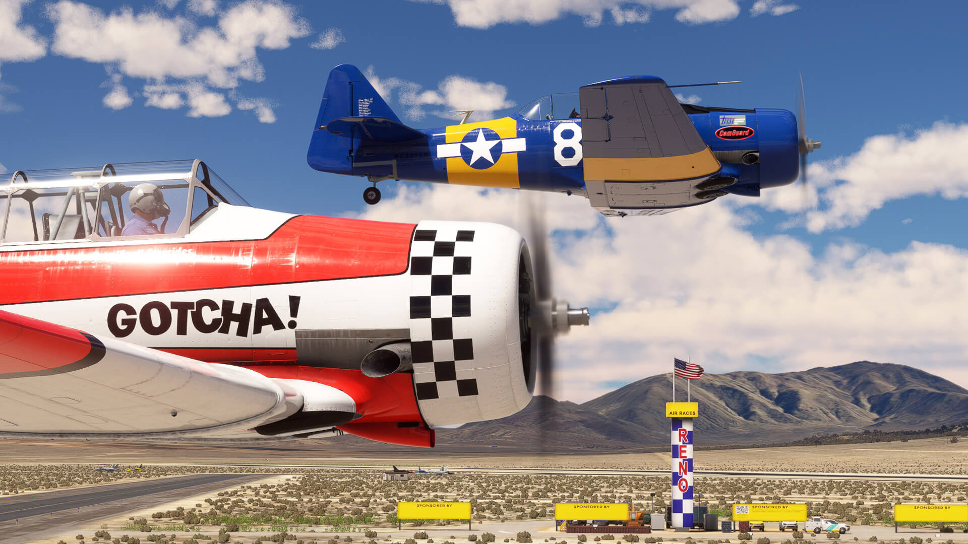 Two T-6 Texan aircraft race through the finish line at the Reno Air Races, Nevada