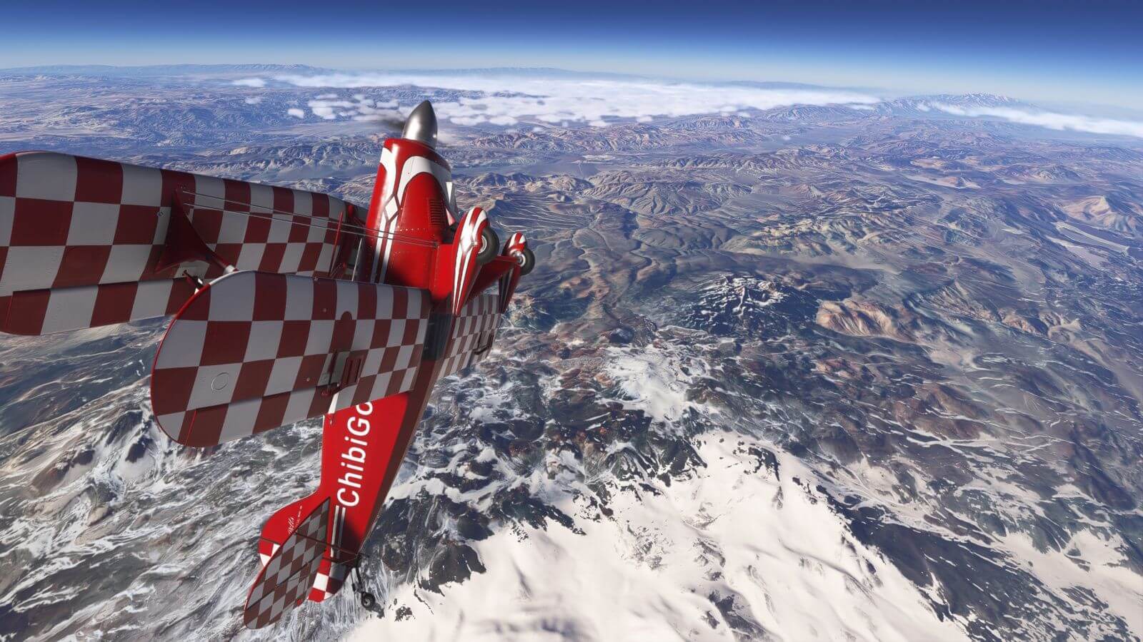 A Pitts Special climbs near vertically.