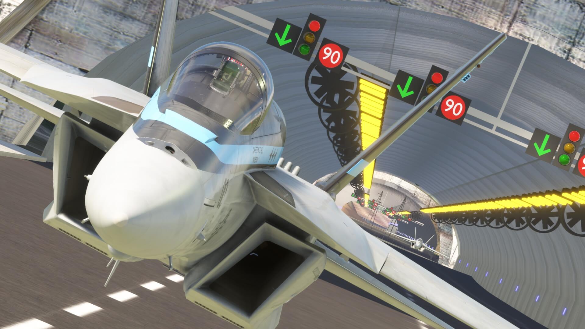 Two F/A-18 Hornets pass low through a highway tunnel at high speed