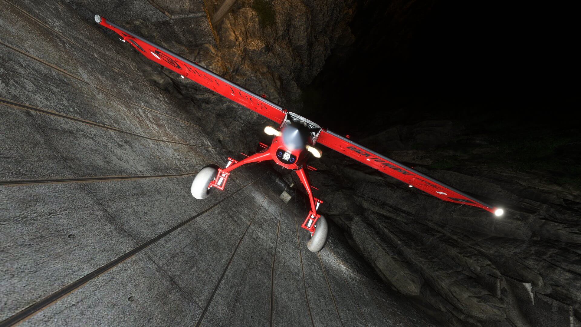 A Draco X in a vertical climb against a Dam wall