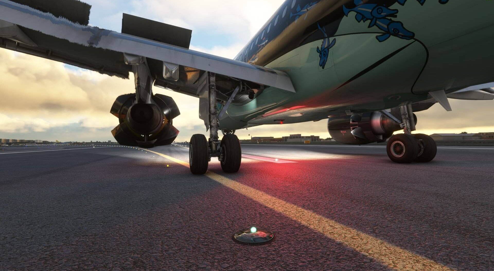 An airliner touching down on a runway with spoilers and reverse thrust deployed