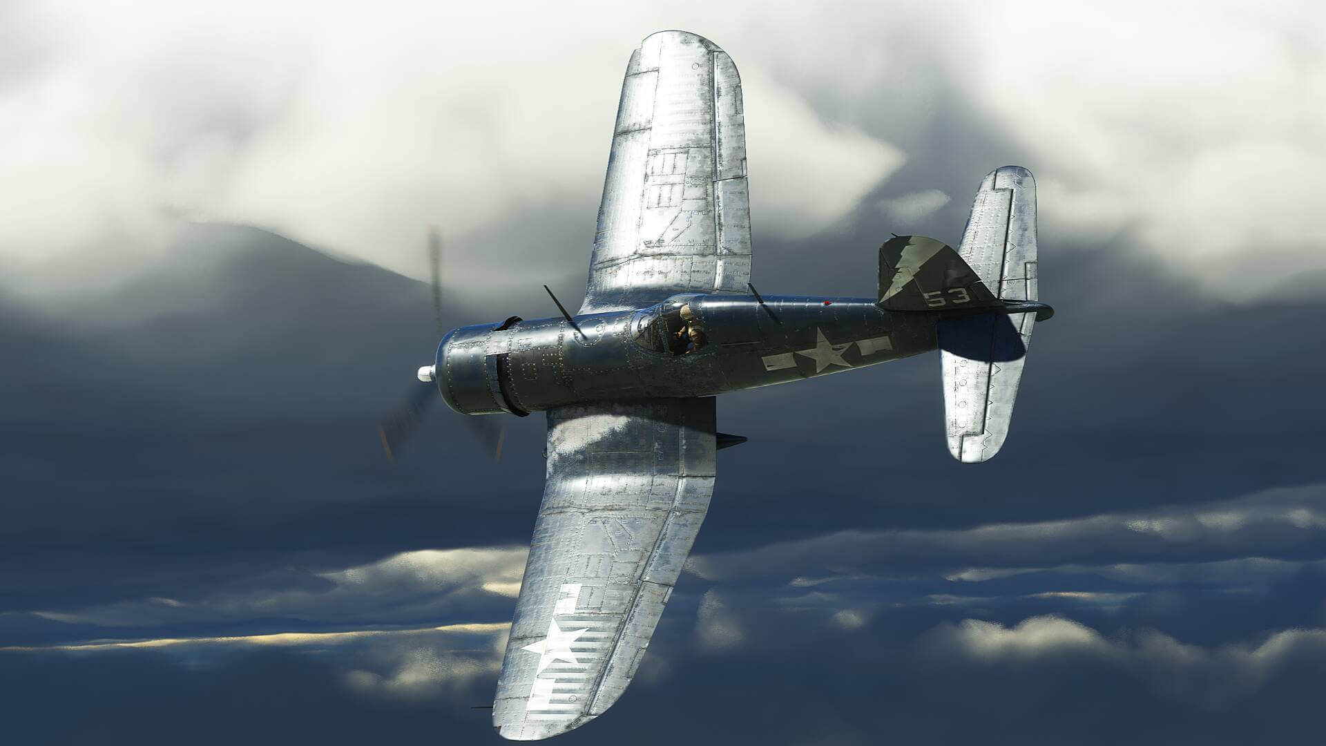 A silver military propeller jet banks sharply to the left