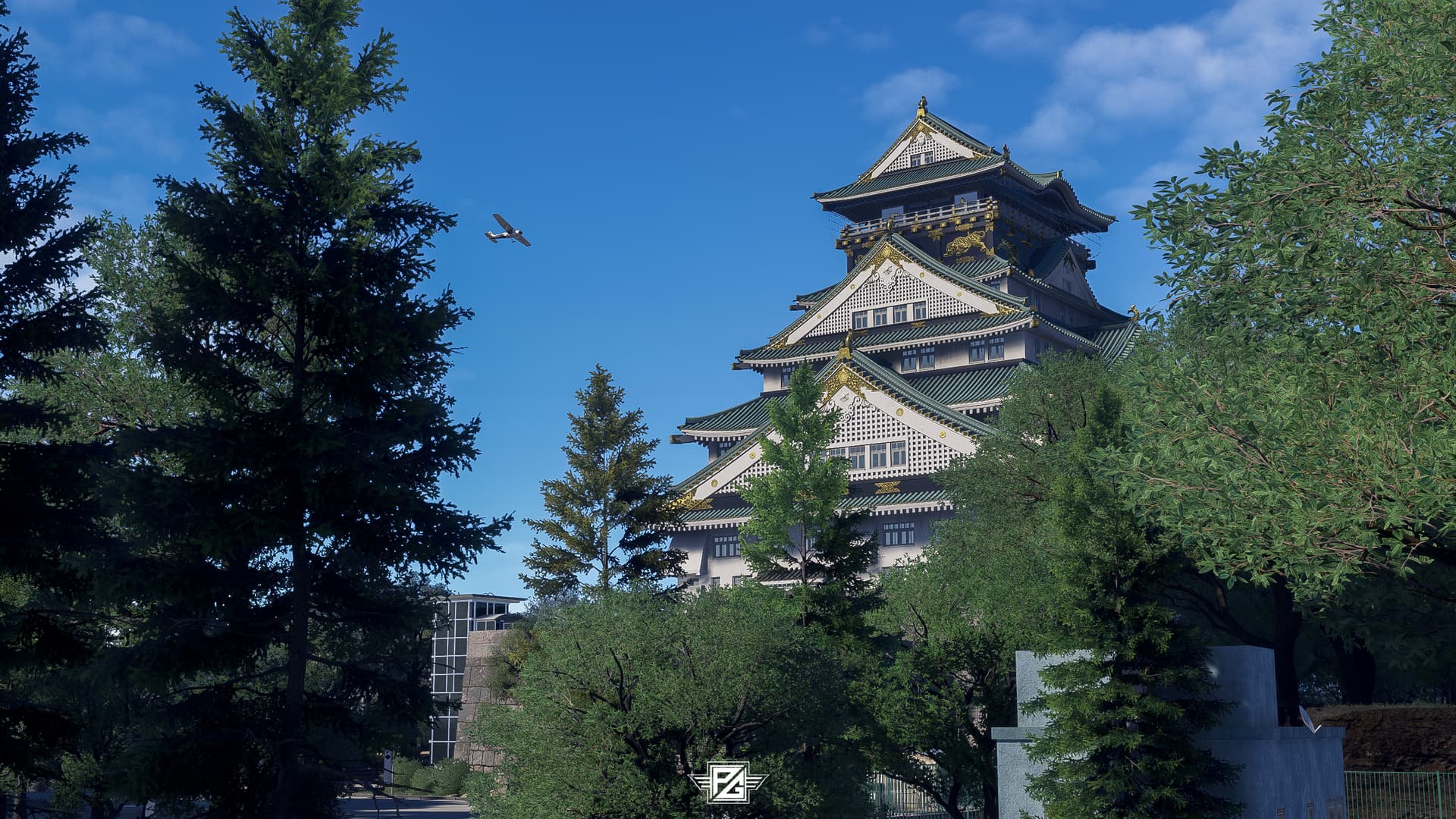 A high-wing propeller aircraft flies near a historic Japanese building