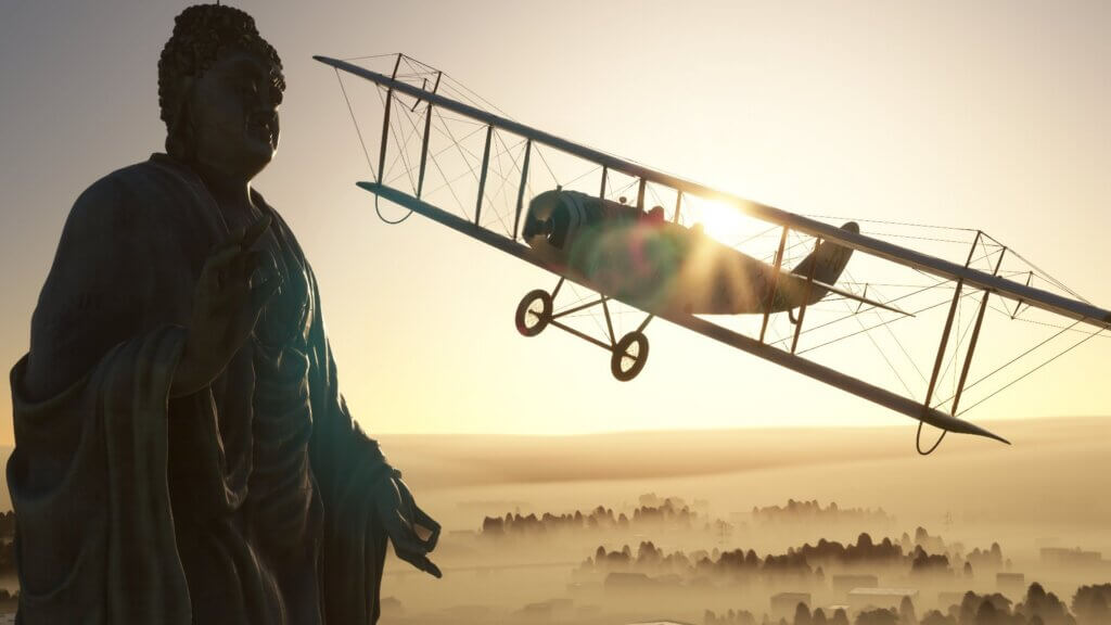 A dual-wing propeller vintage aircraft flies past a monument with thick fog below