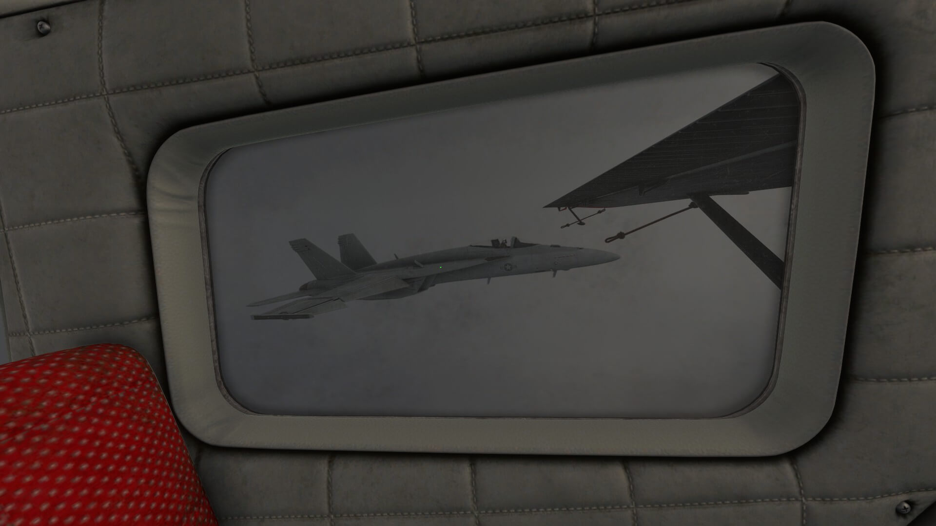 A view through the window of a high-wing aircraft with an F/A-18 Hornet in close formation