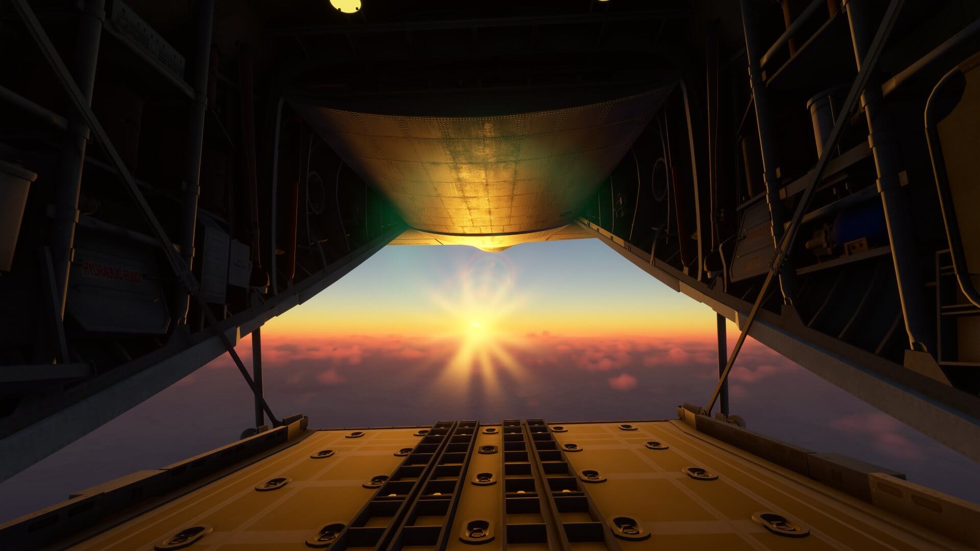 The view from the ramp lowered on a cargo aircraft as the sun rises on the horizon