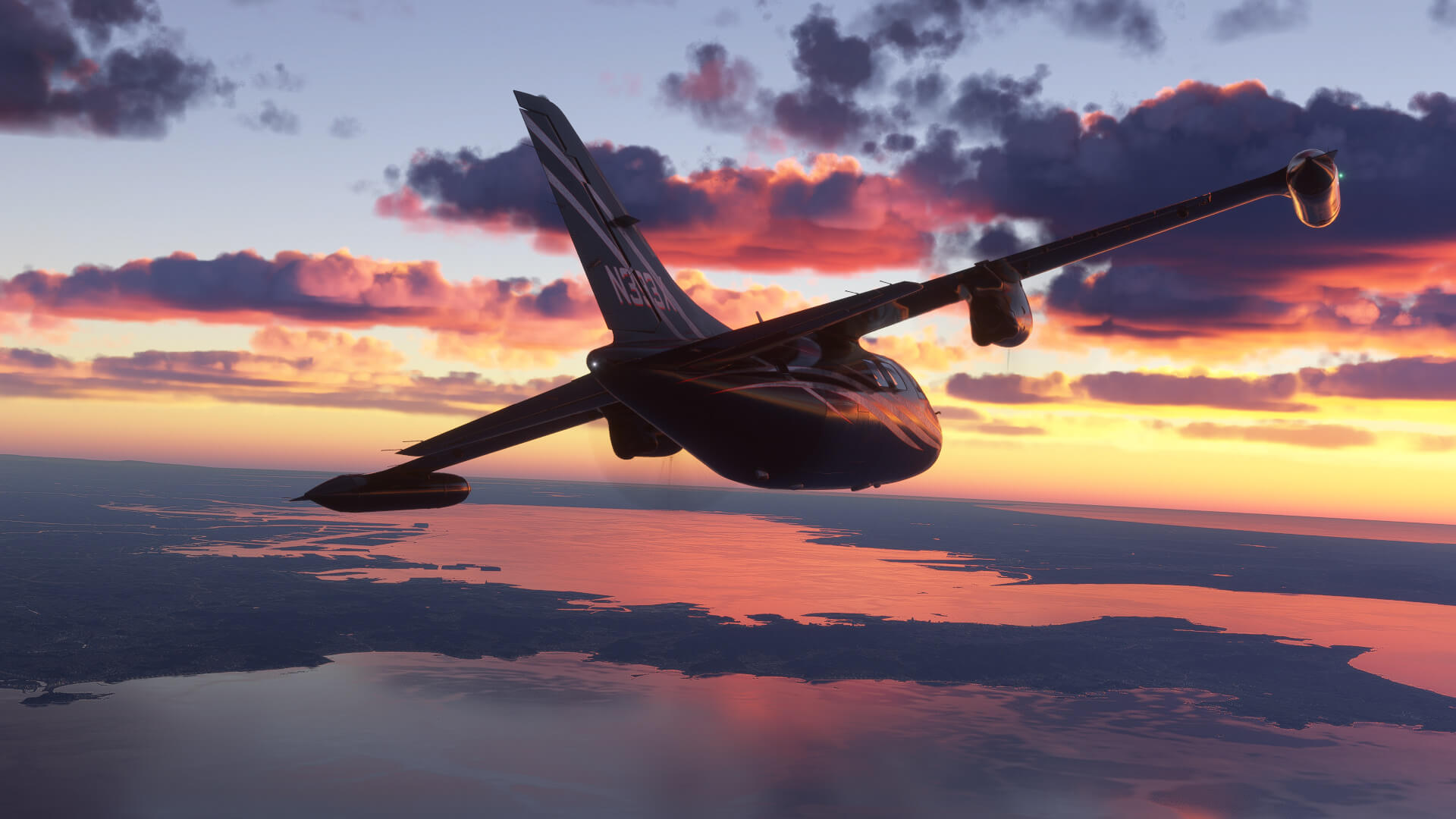 A business jet banks to the left whilst cruising during sunrise