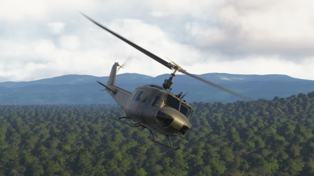 UH-1 helicopter "Huey" flying over greenery
