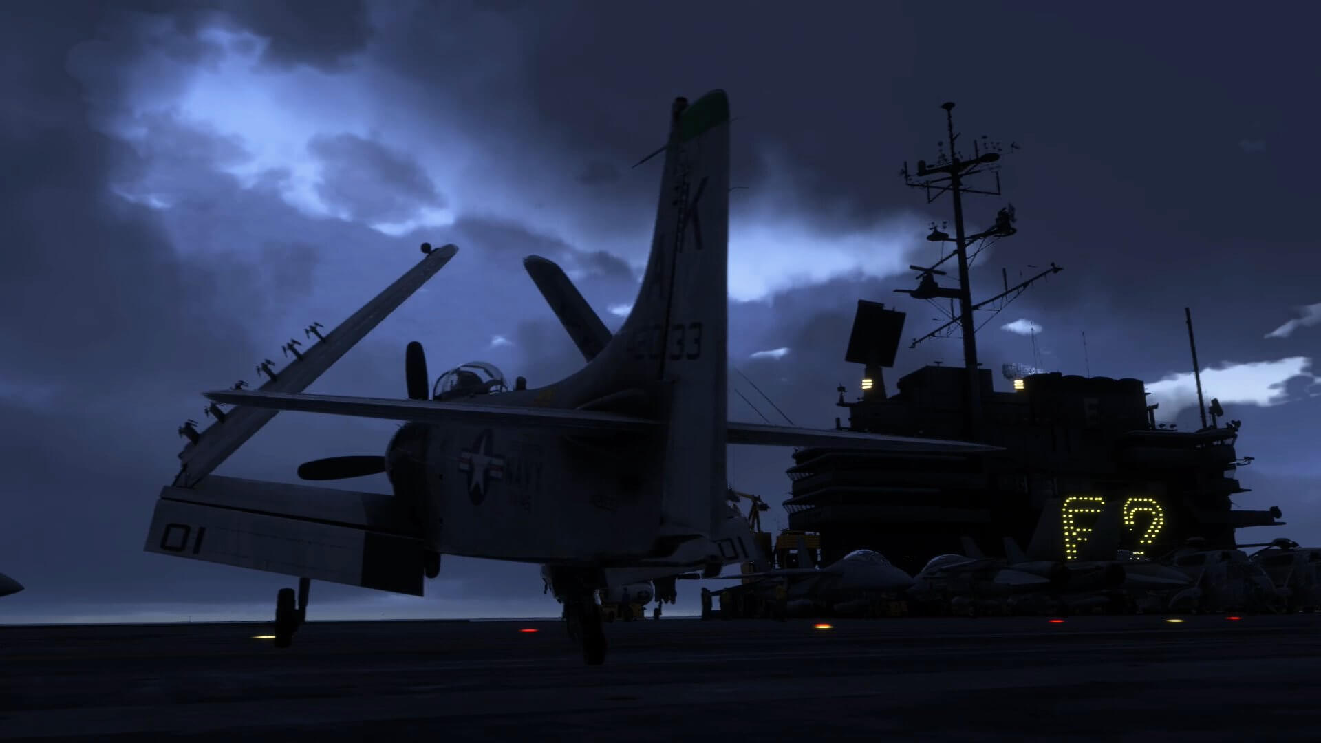 Warbirds with wings folded on the deck of an aircraft carrier