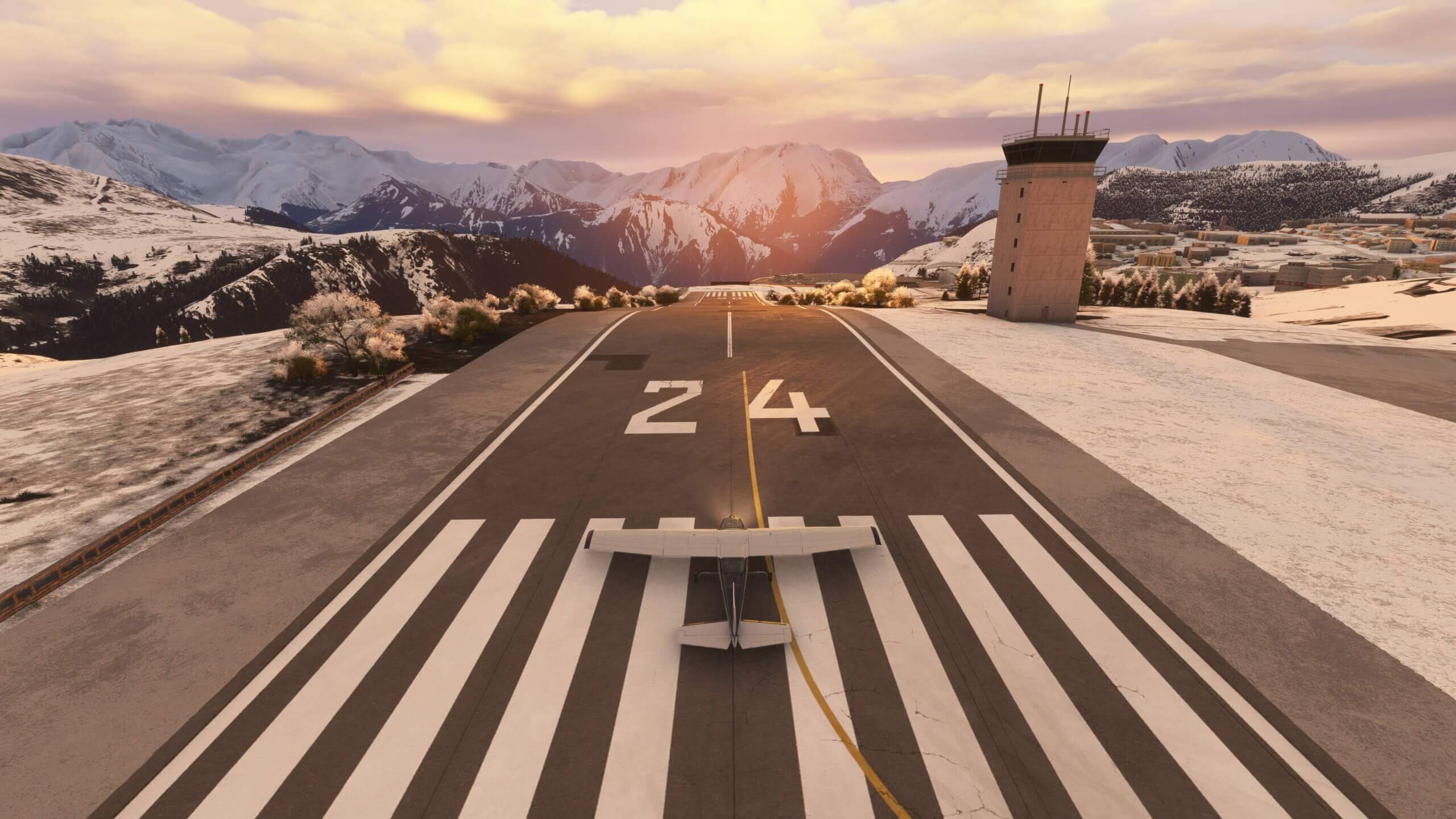 A high winer propeller aircraft lines up for takeoff on runway 24 at Courchevel airport