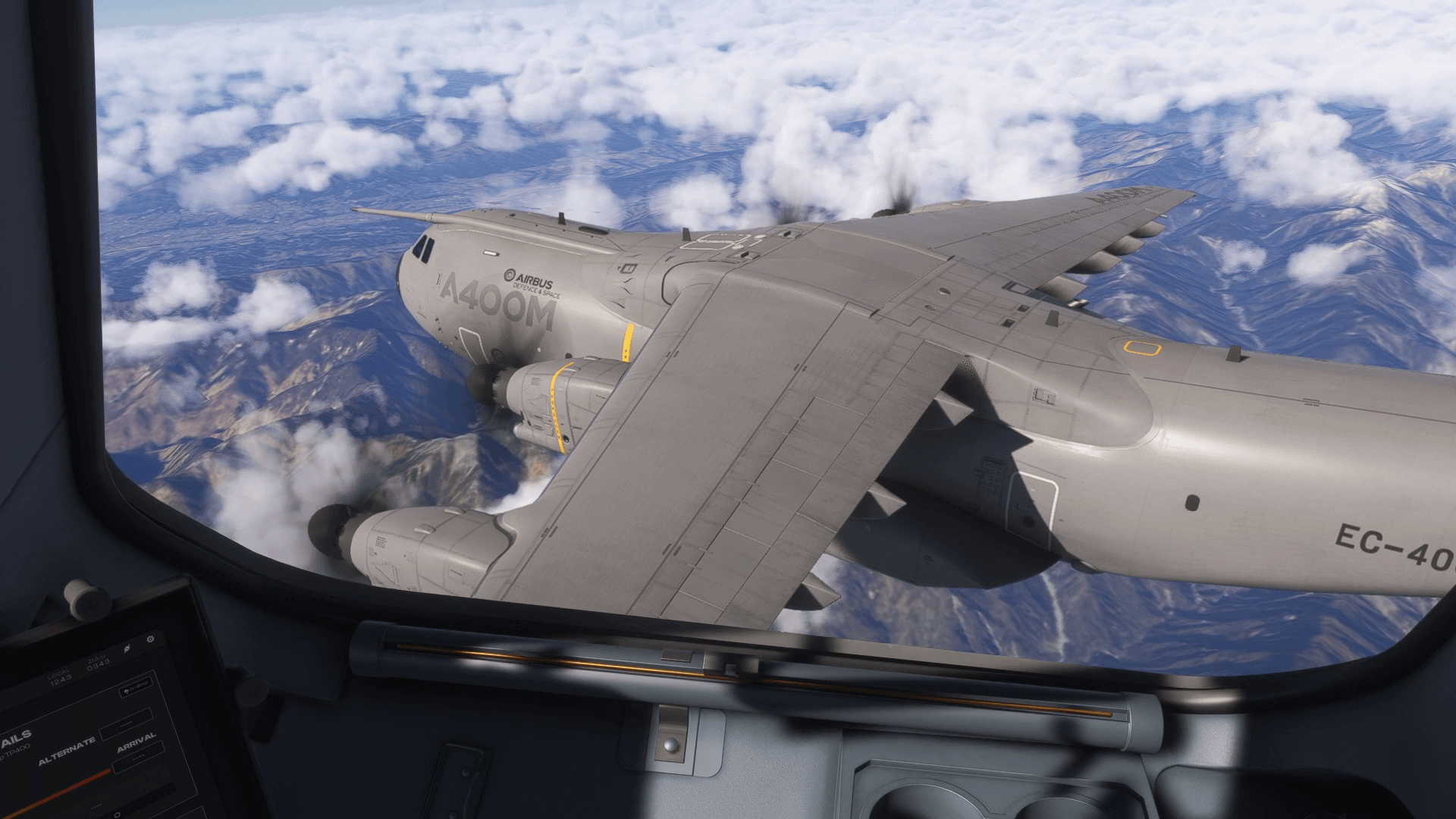 The view from the flight deck of an aircraft flying in close formation with an Airbus A400M