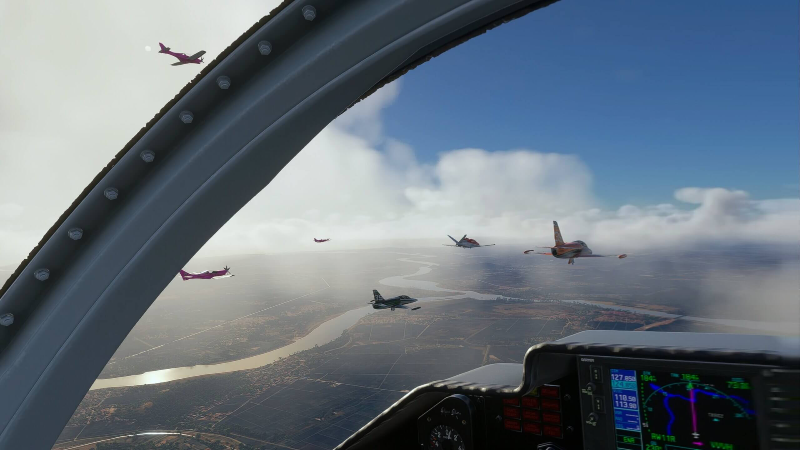 Aircraft flying in close formation for Fly-In Friday