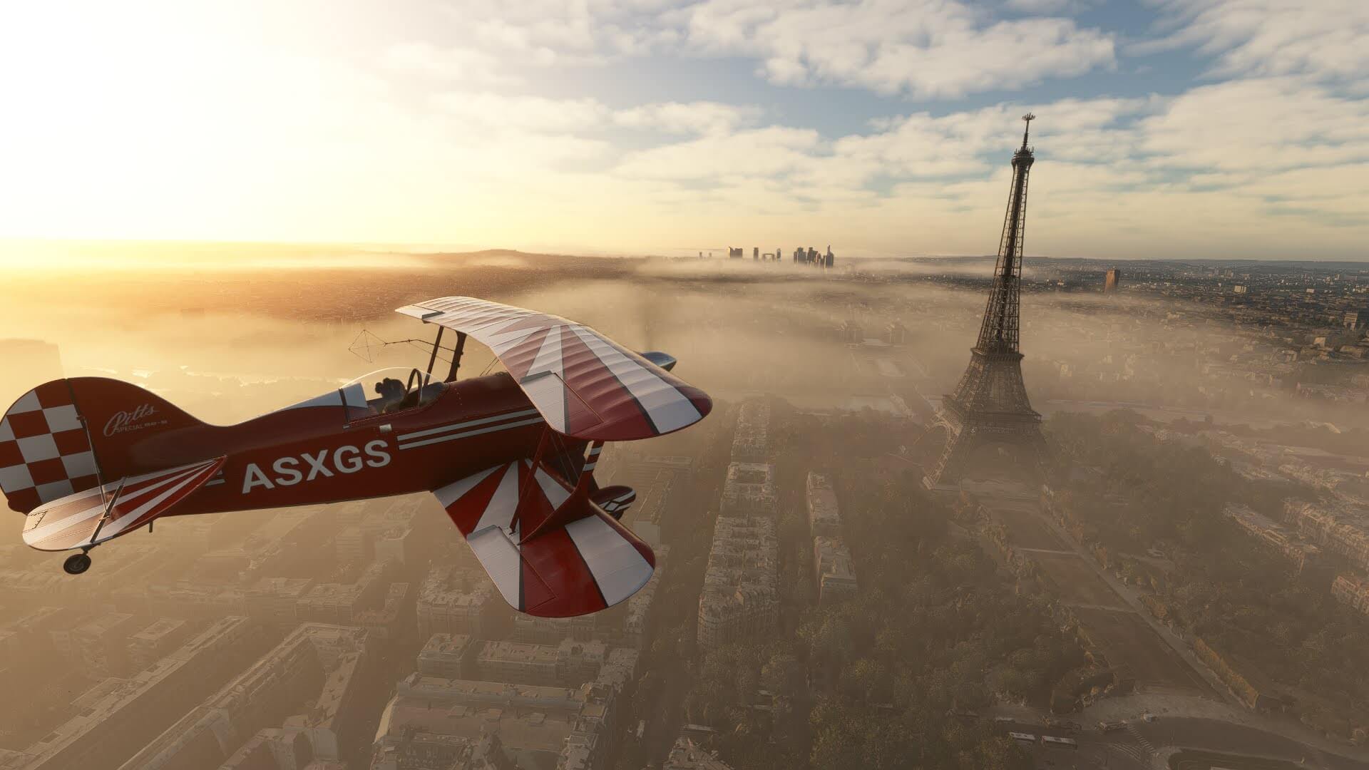 A Pitt propeller plane flies close to the Eiffel Tower, Paris