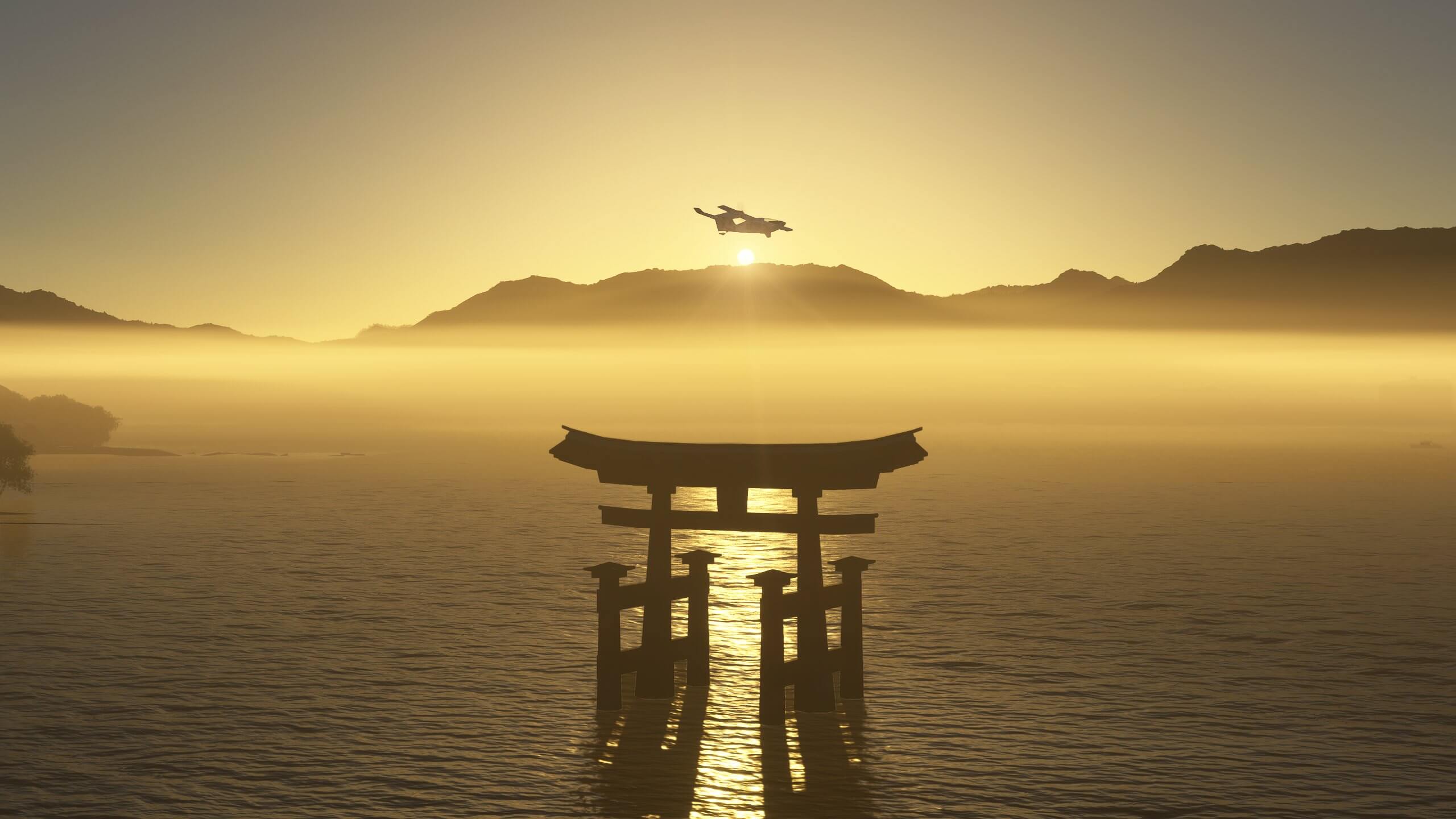 An aircraft flies over a Japanese monument during golden hour